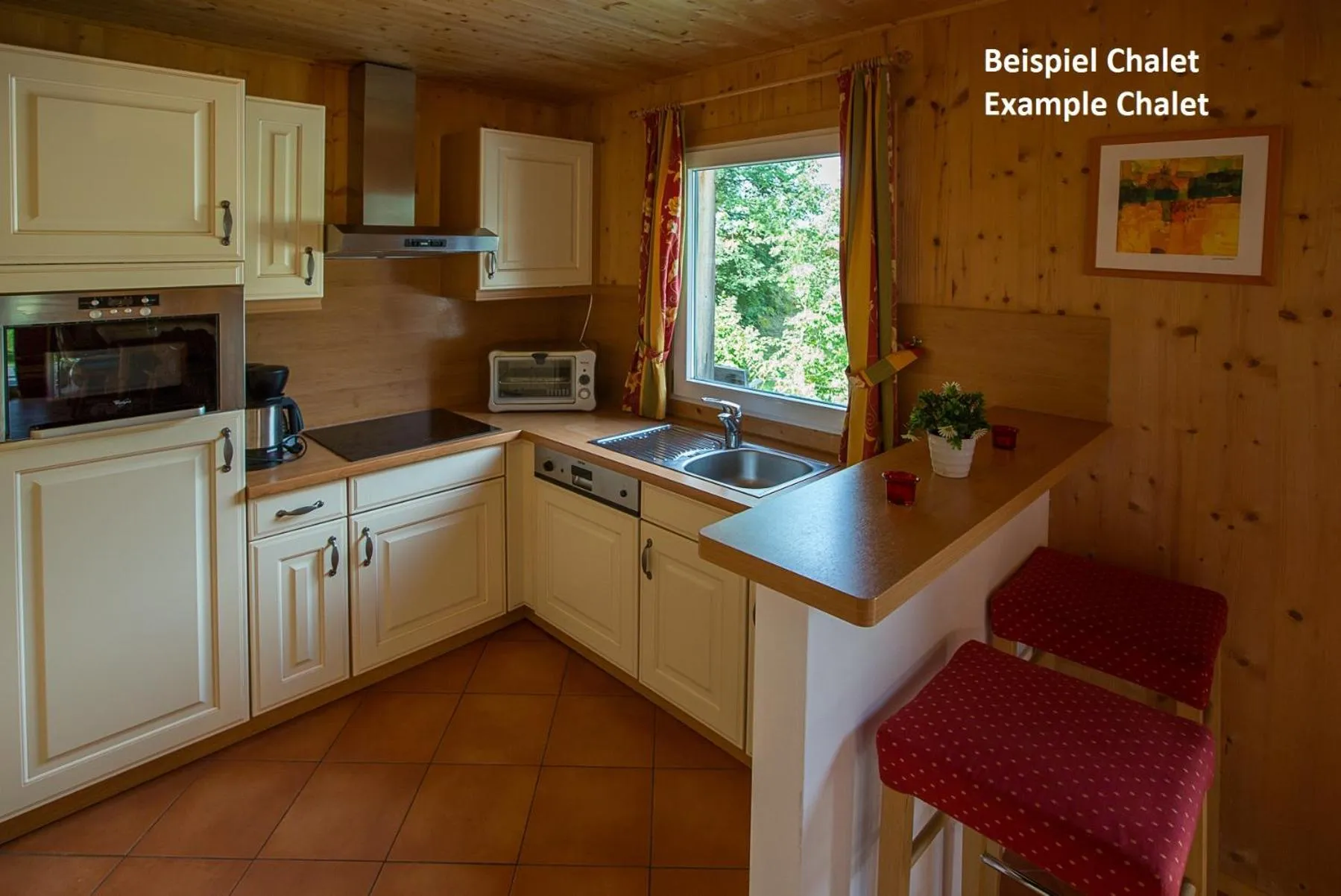 Kitchen or kitchenette in Alpendorf Dachstein West by ALPS RESORTS