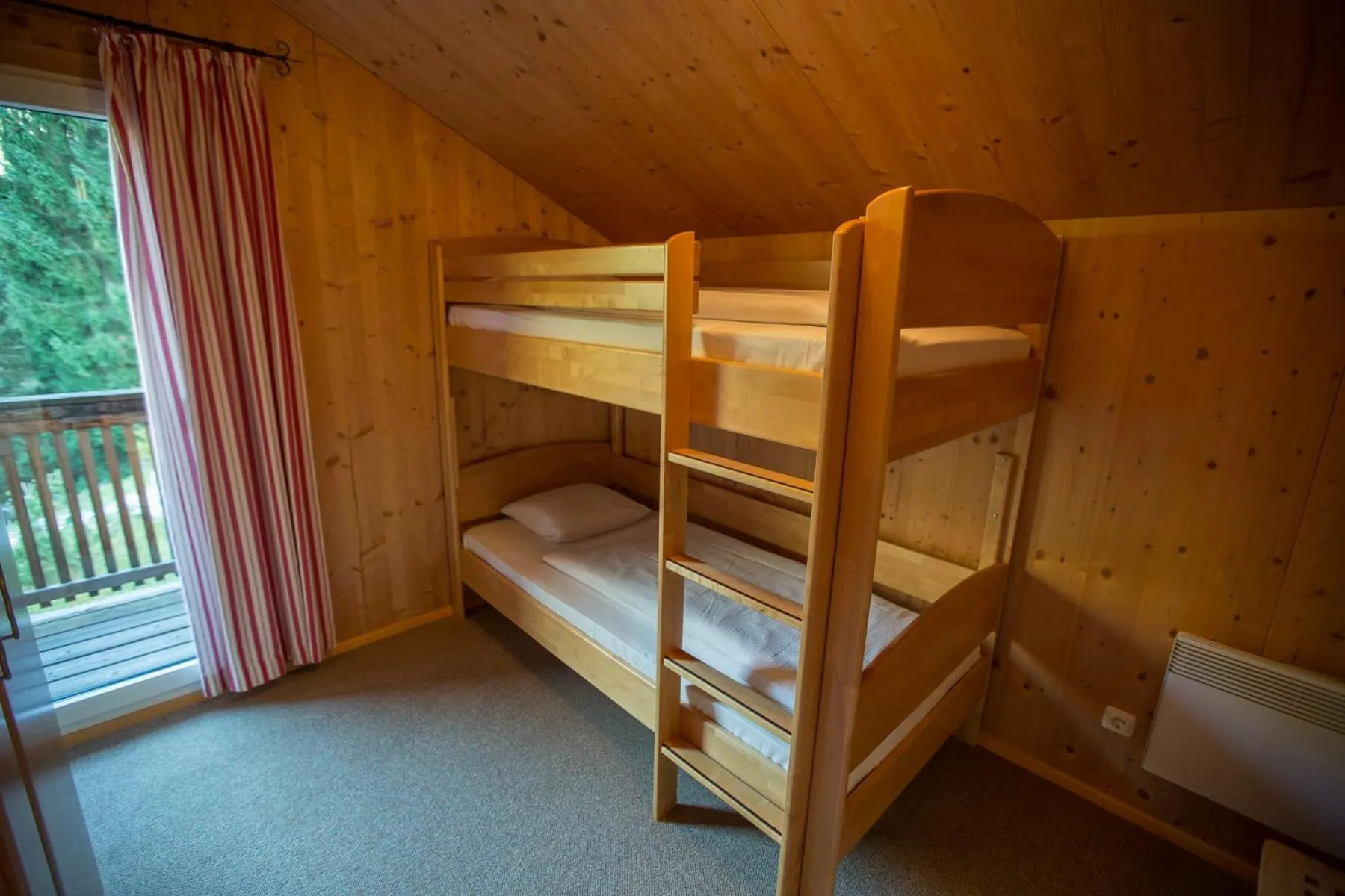 Bedroom, Bed in Alpendorf Dachstein West by ALPS RESORTS