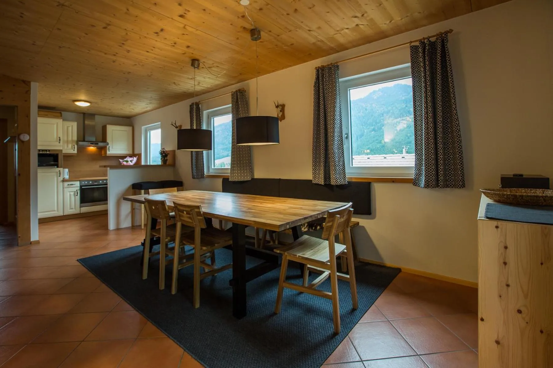 Dining area in Alpendorf Dachstein West by ALPS RESORTS