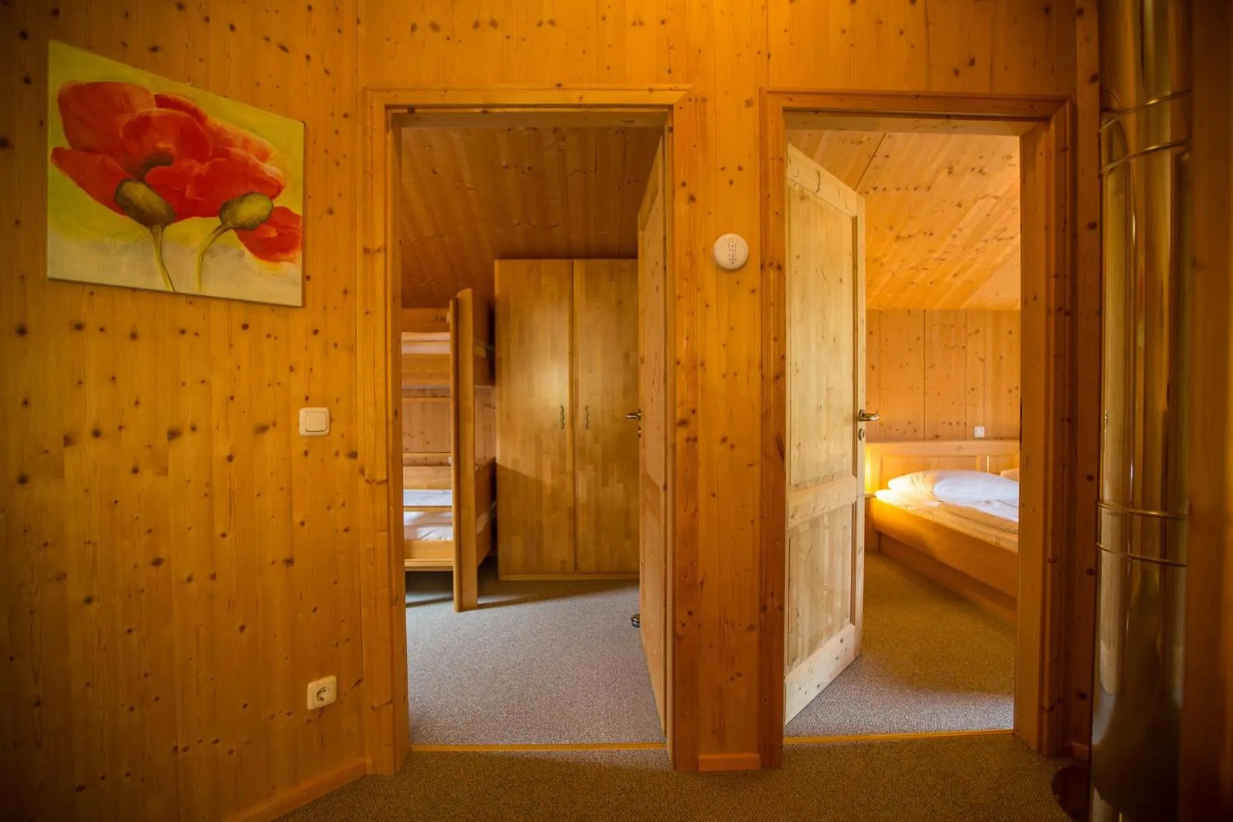 Bedroom, Bed in Alpendorf Dachstein West by ALPS RESORTS