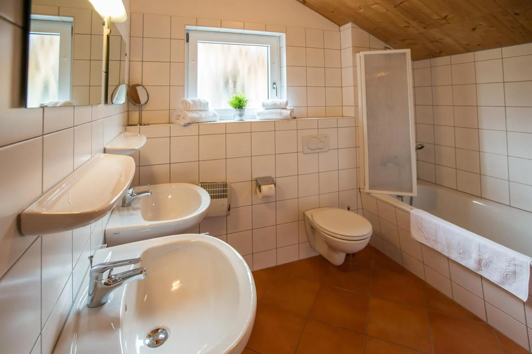 Bathroom in Alpendorf Dachstein West by ALPS RESORTS