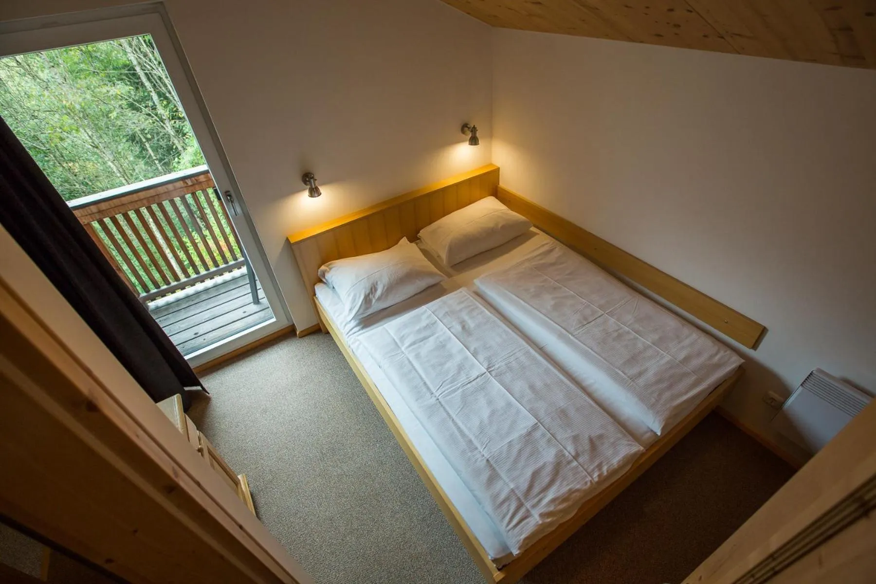 Bedroom, Bed in Alpendorf Dachstein West by ALPS RESORTS
