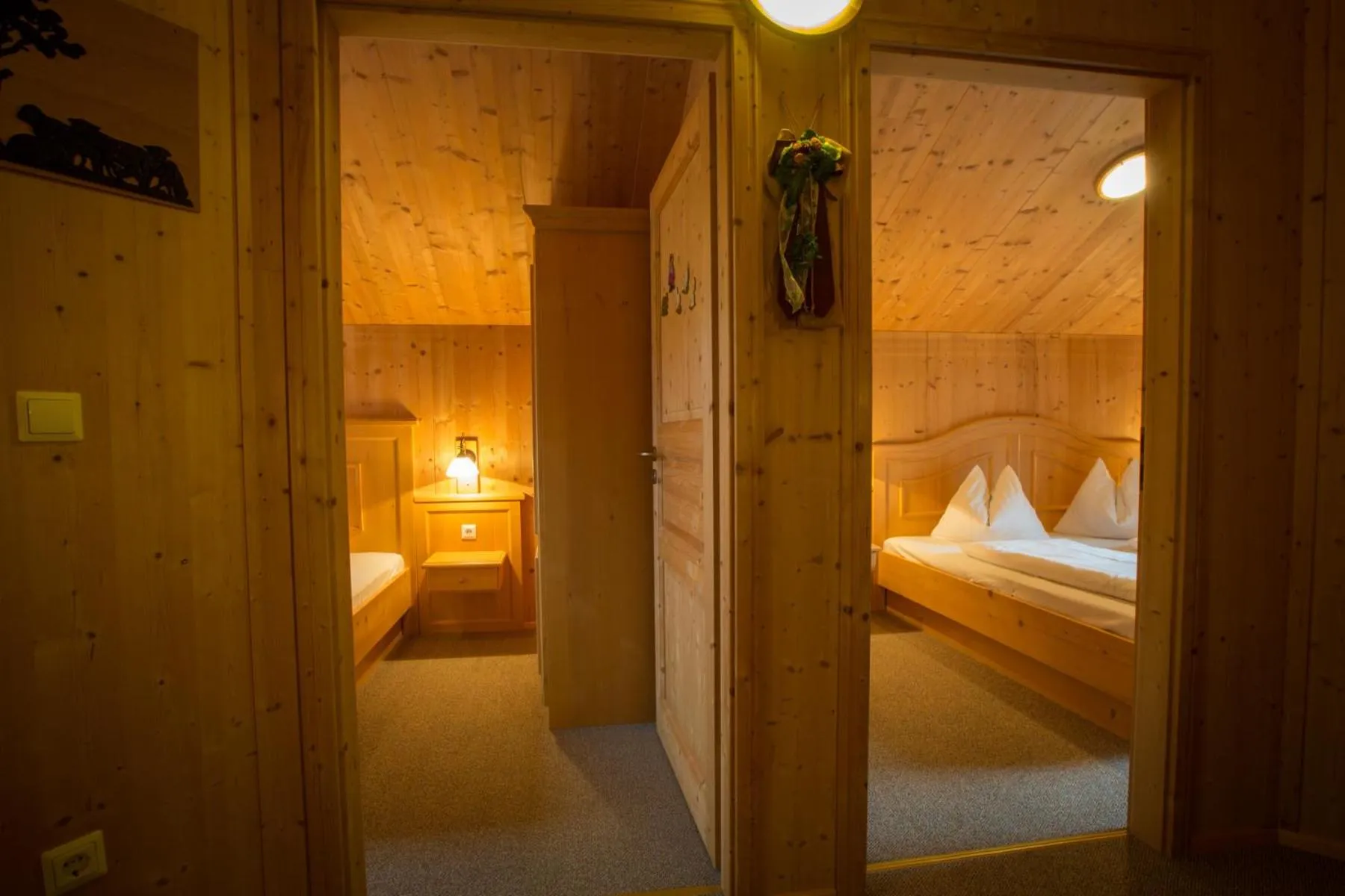 Bedroom, Bed in Alpendorf Dachstein West by ALPS RESORTS