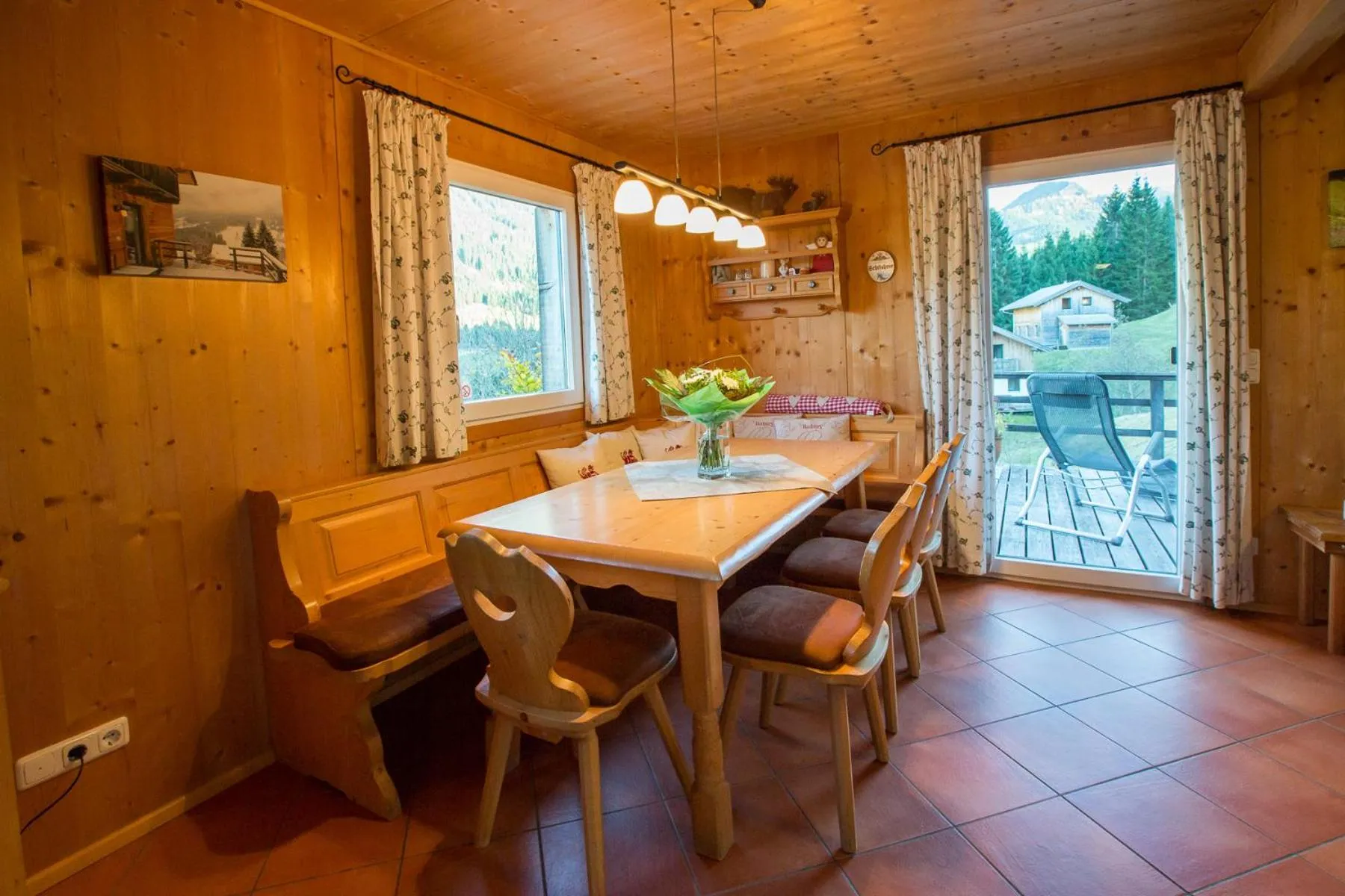Dining area in Alpendorf Dachstein West by ALPS RESORTS