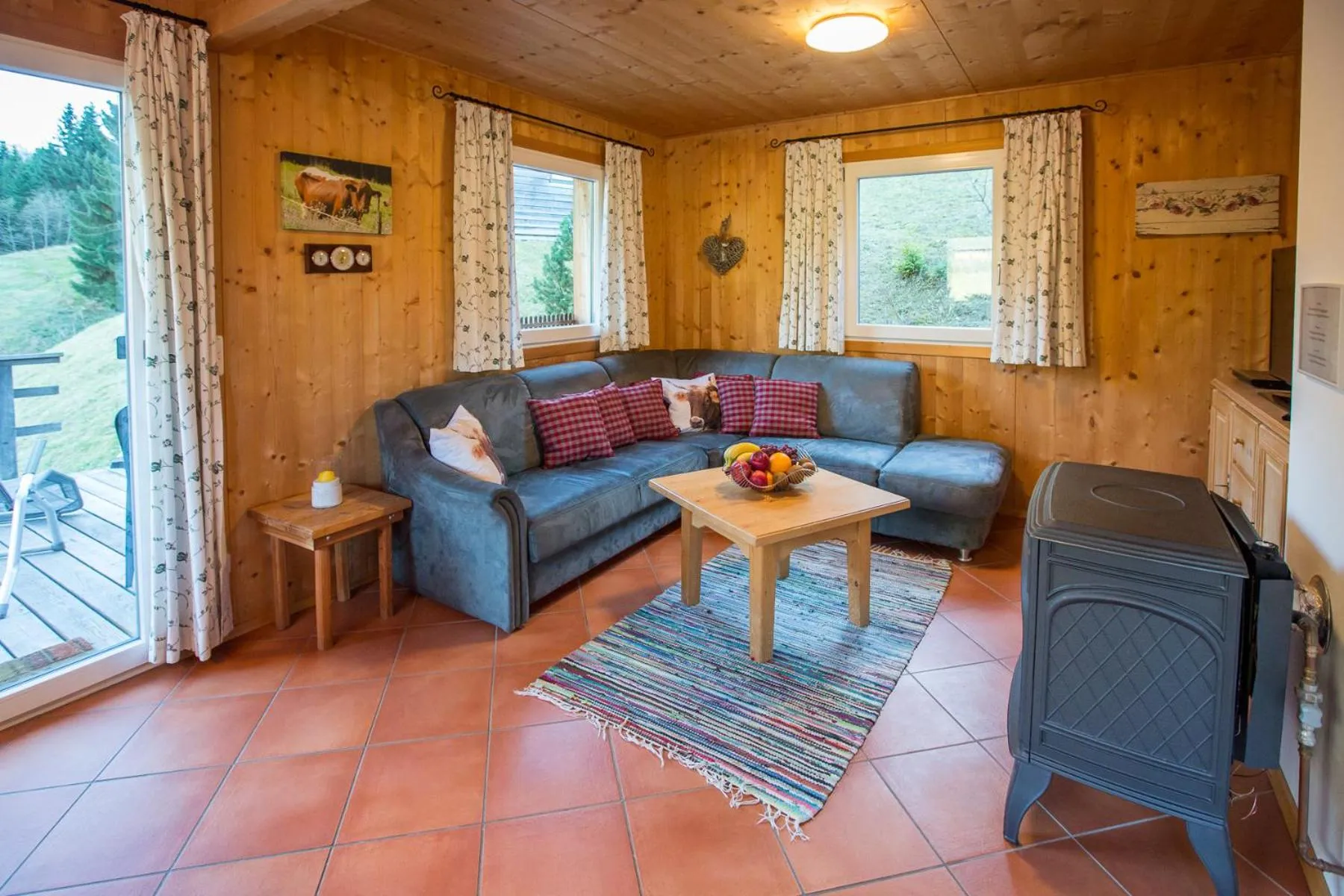 Living room in Alpendorf Dachstein West by ALPS RESORTS