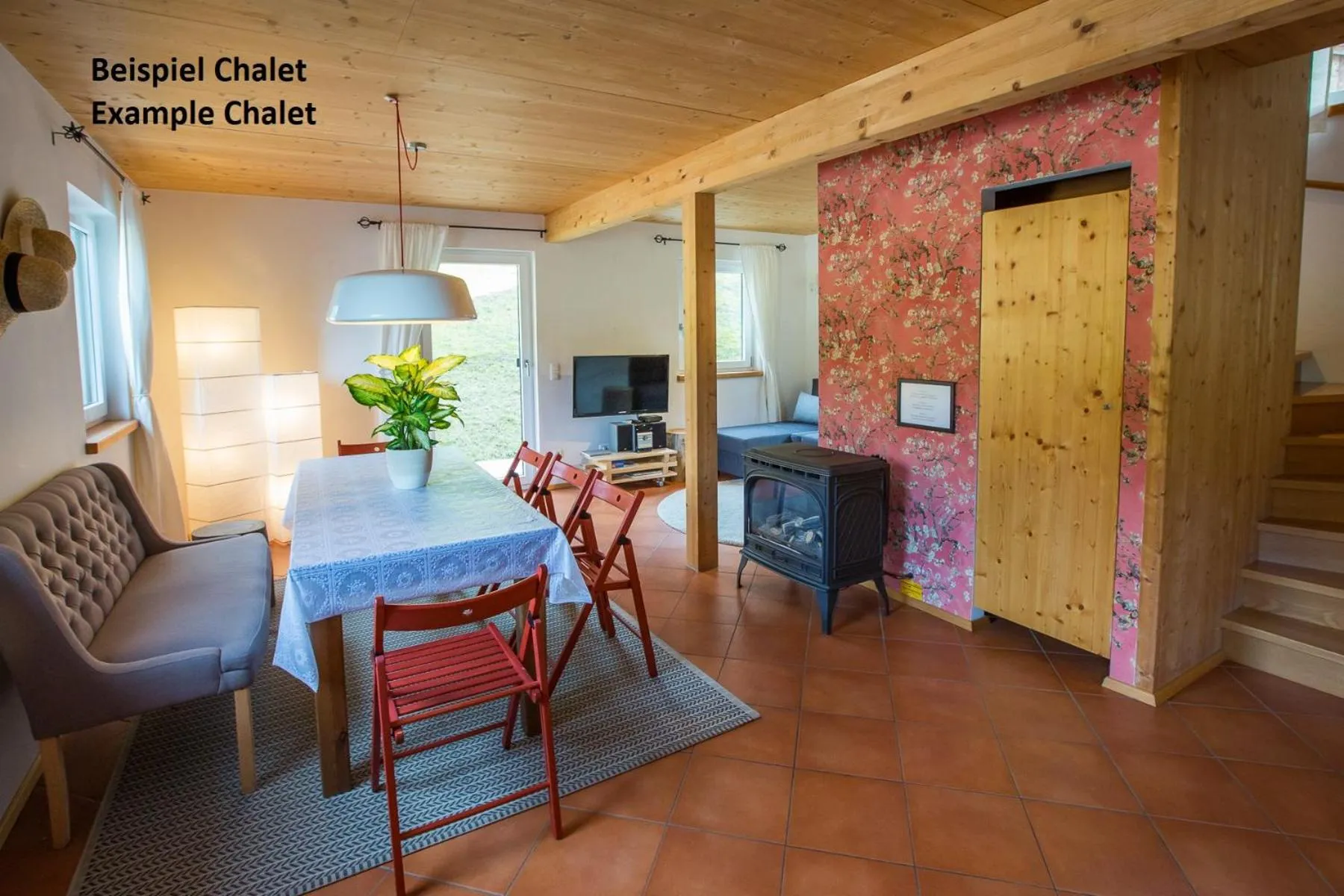 Living room in Alpendorf Dachstein West by ALPS RESORTS