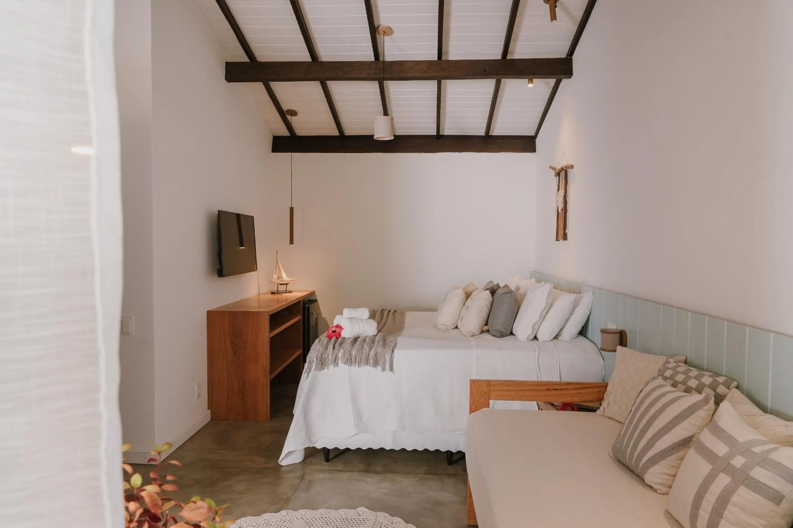 Bedroom in Aqualtune Pousada