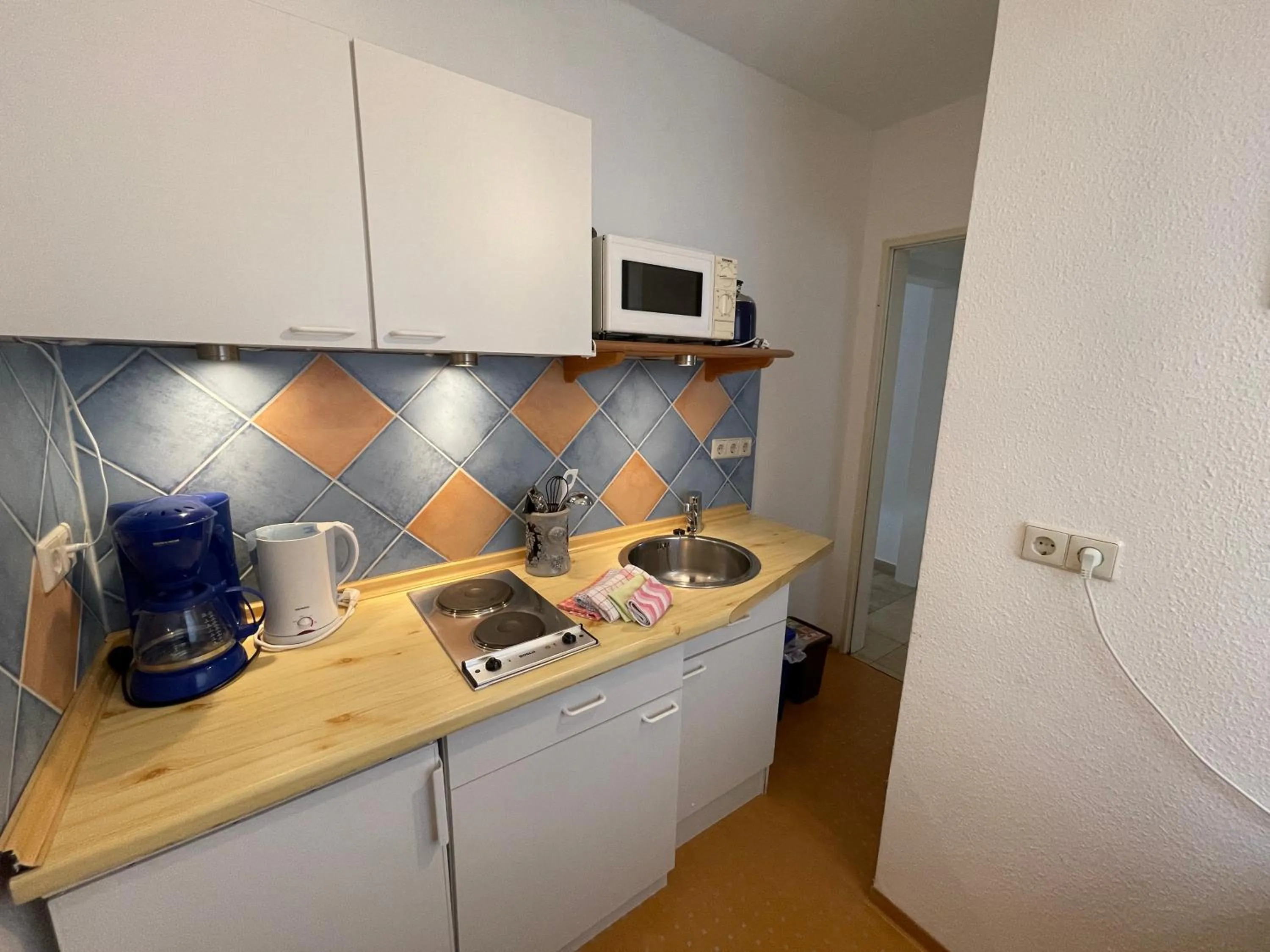 Kitchen or kitchenette in Ferienwohnungen Haus zur Linde
