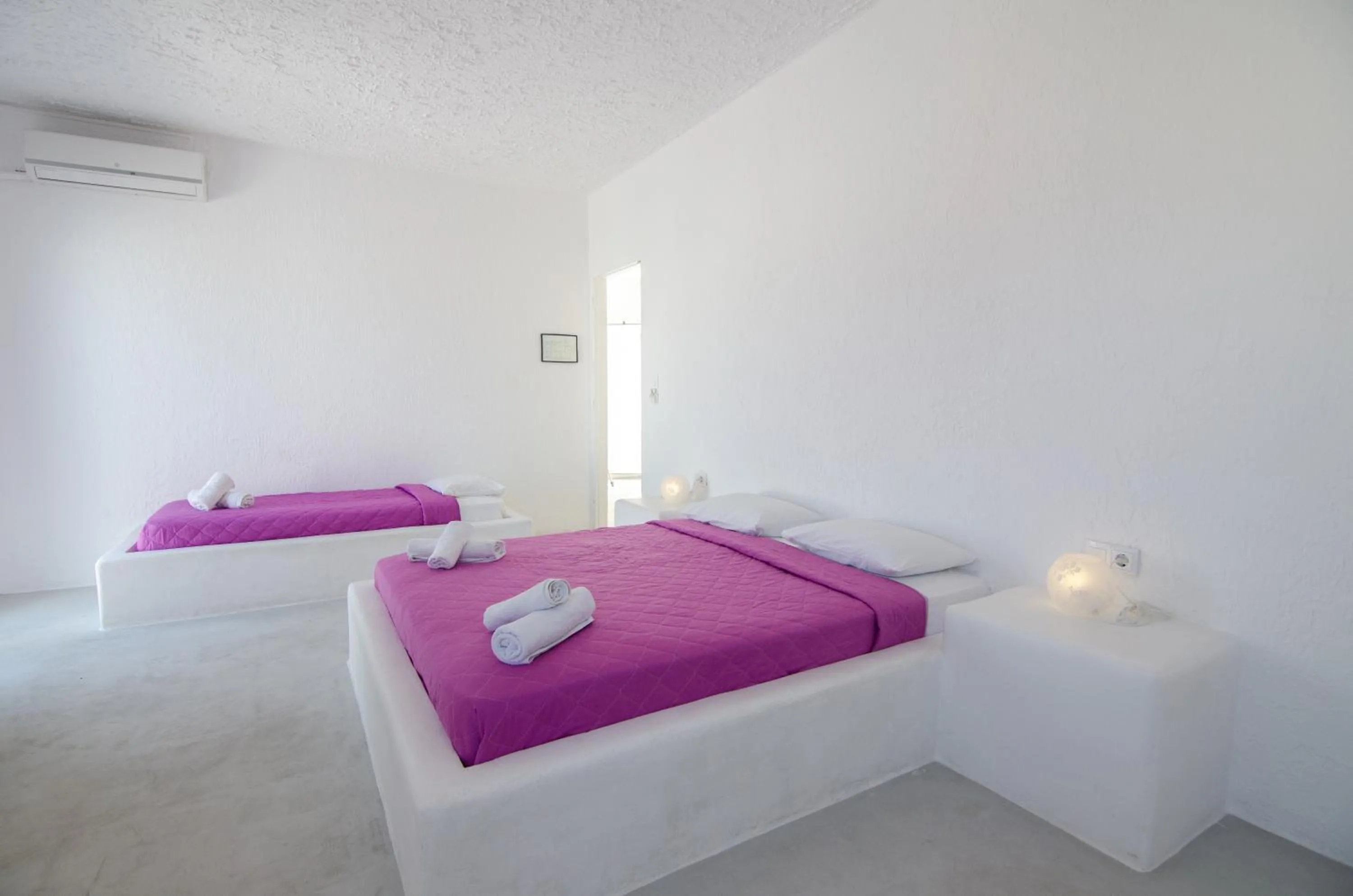 Bed in Sunrise Hotel