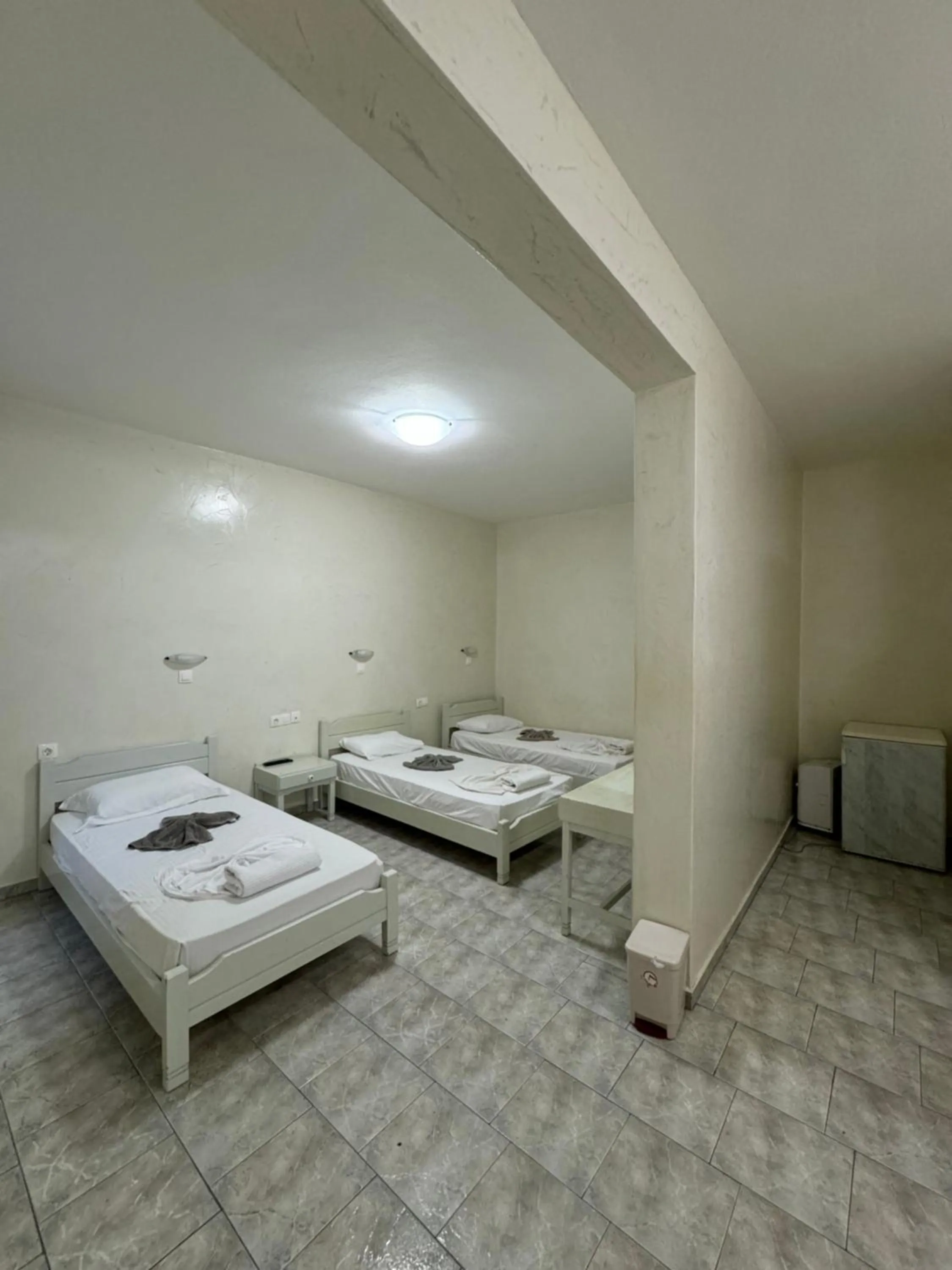 Bed in Sunrise Hotel