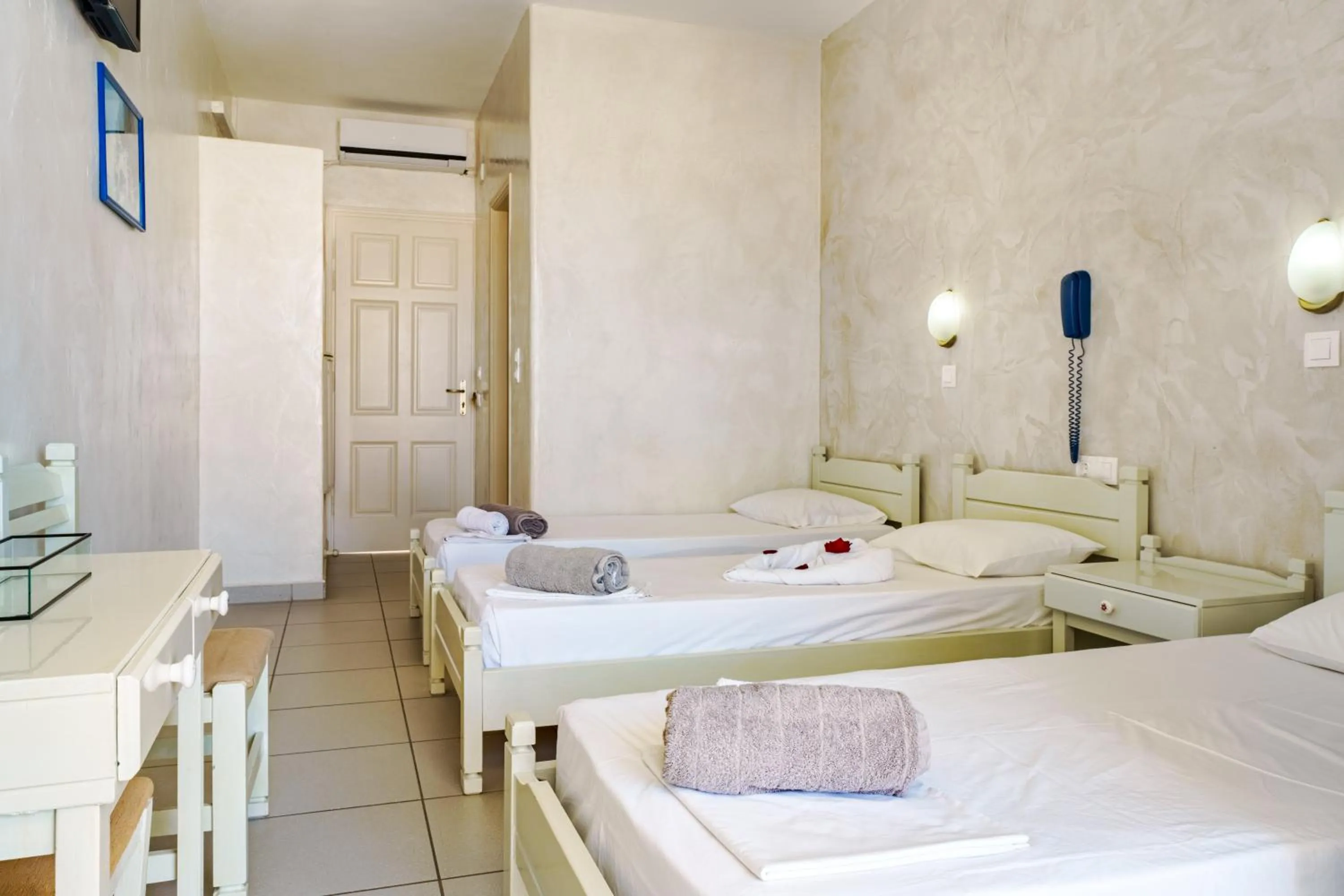 Bed in Sunrise Hotel