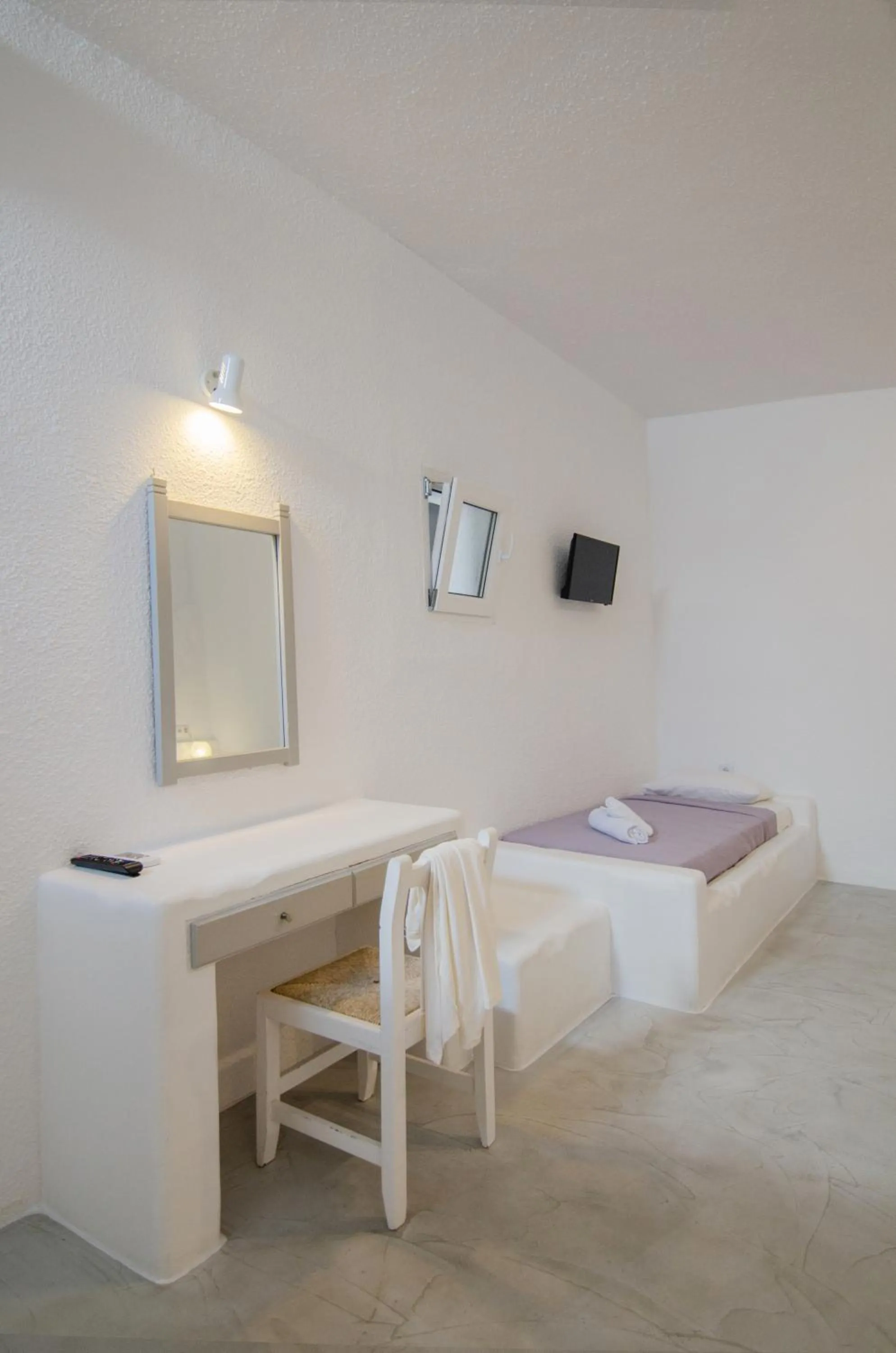 Bed in Sunrise Hotel