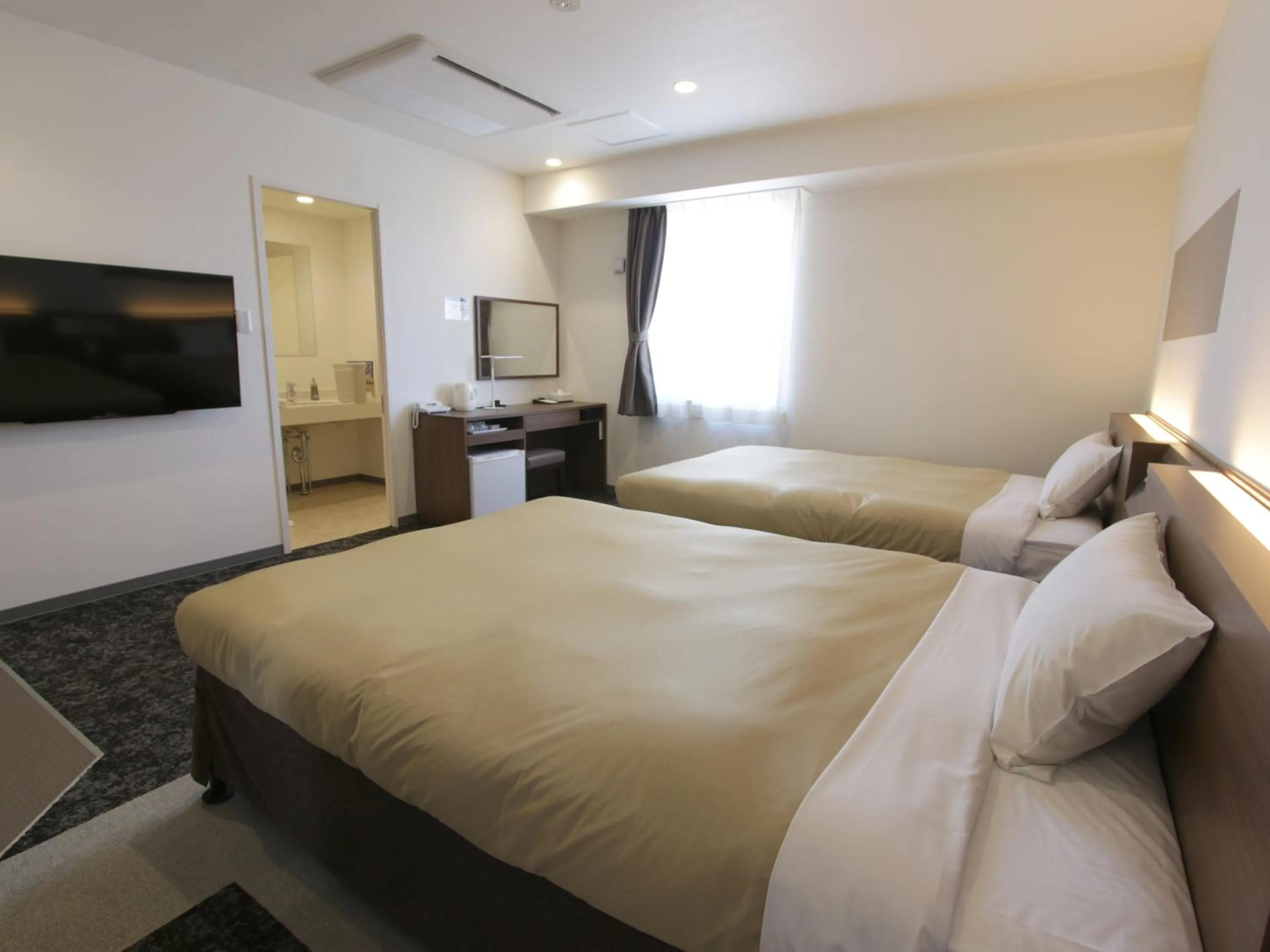 Photo of the whole room, Bed in Hotel New Gaea Nishi Kumamoto Ekimae