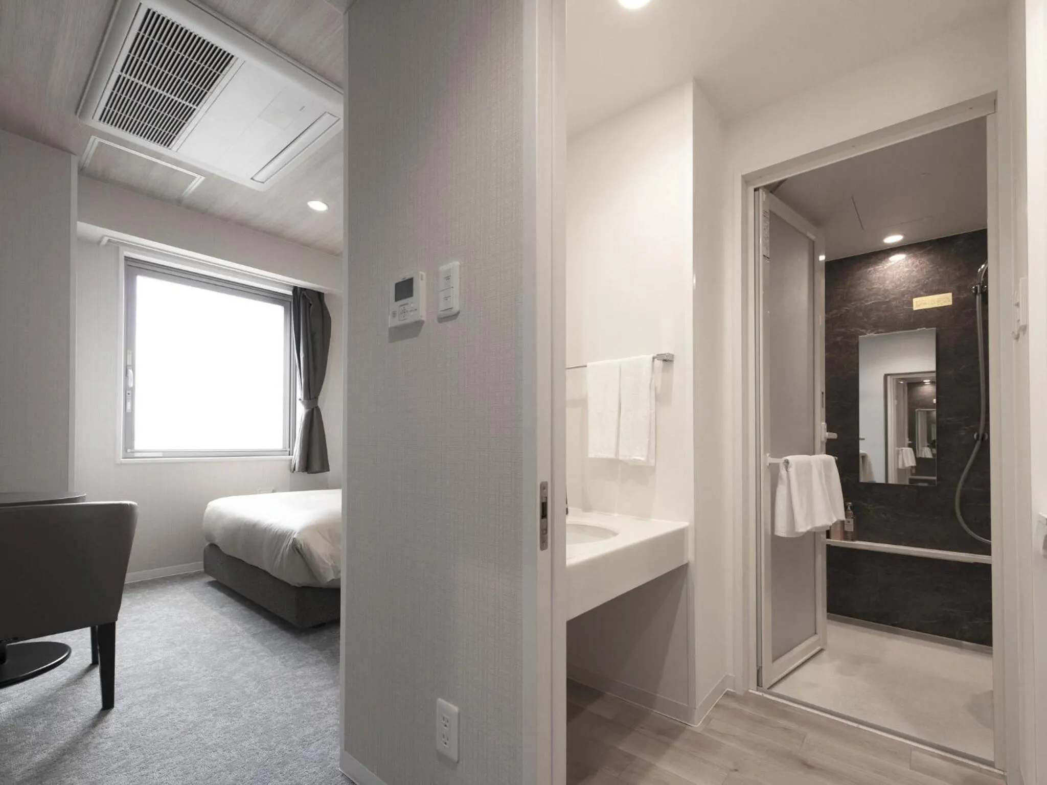 Bed in Hotel New Gaea Nishi Kumamoto Ekimae