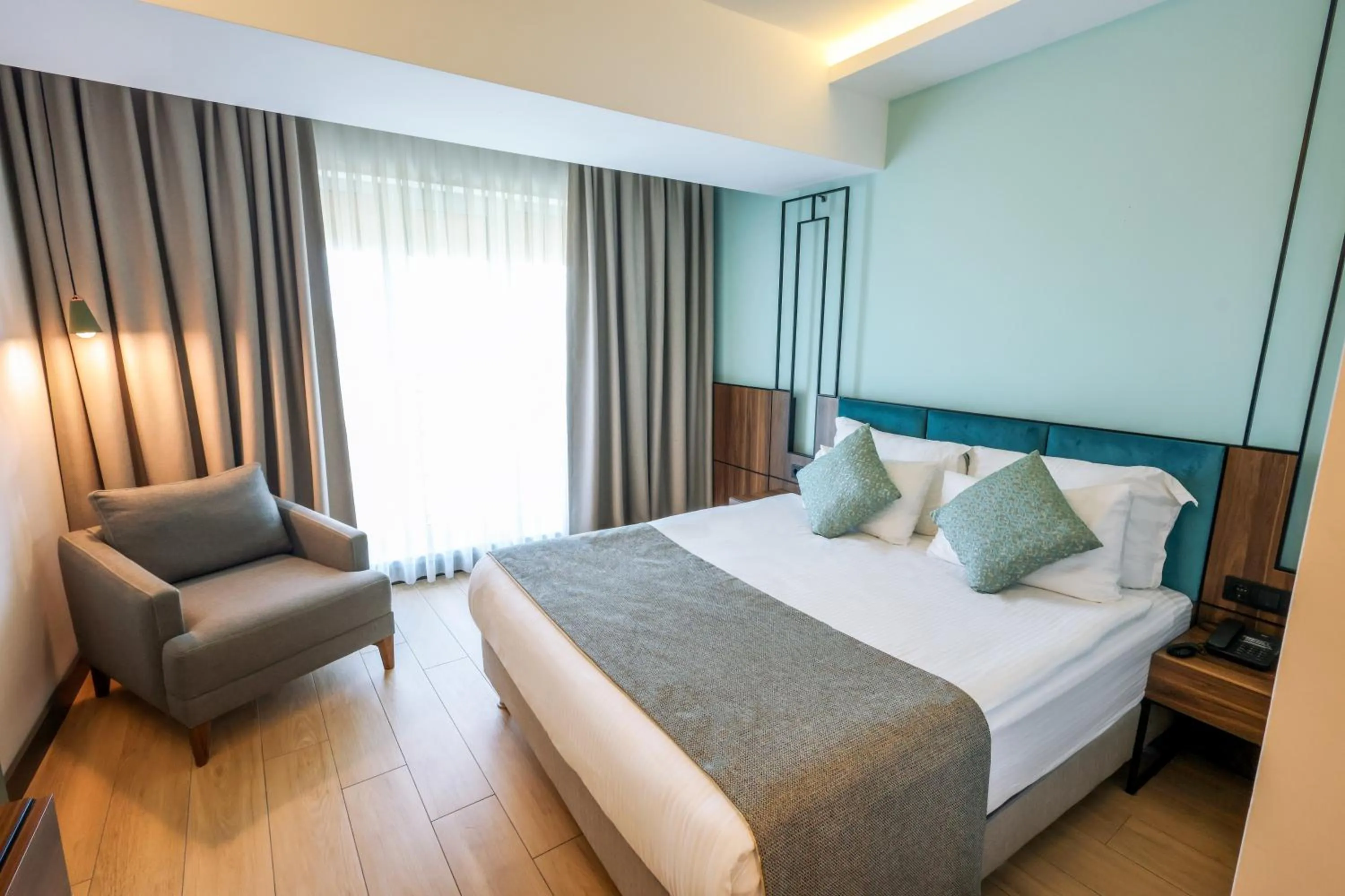 Bed in Leaf Port Hotel