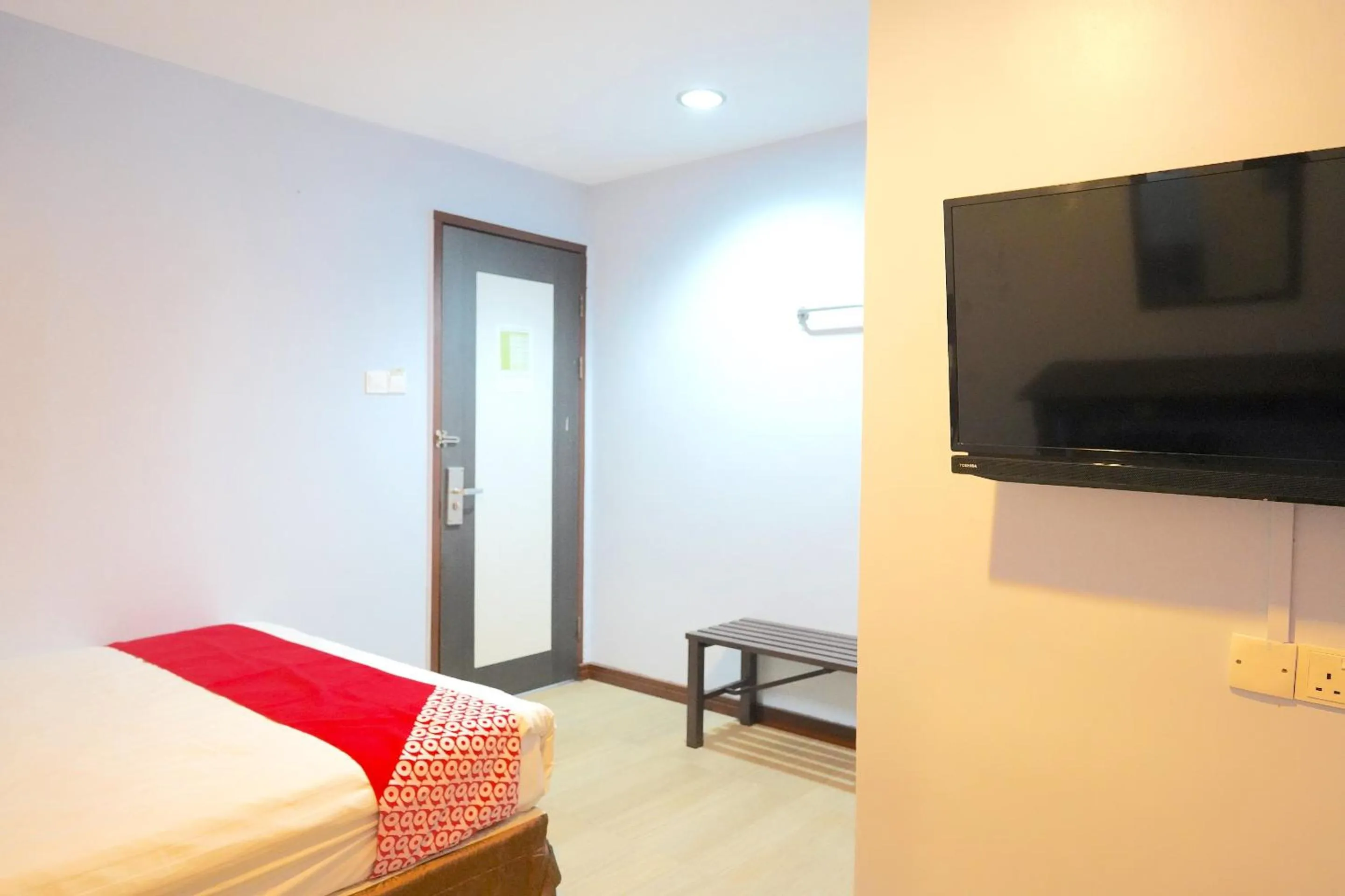 Bedroom in Hotel O Utama Inn