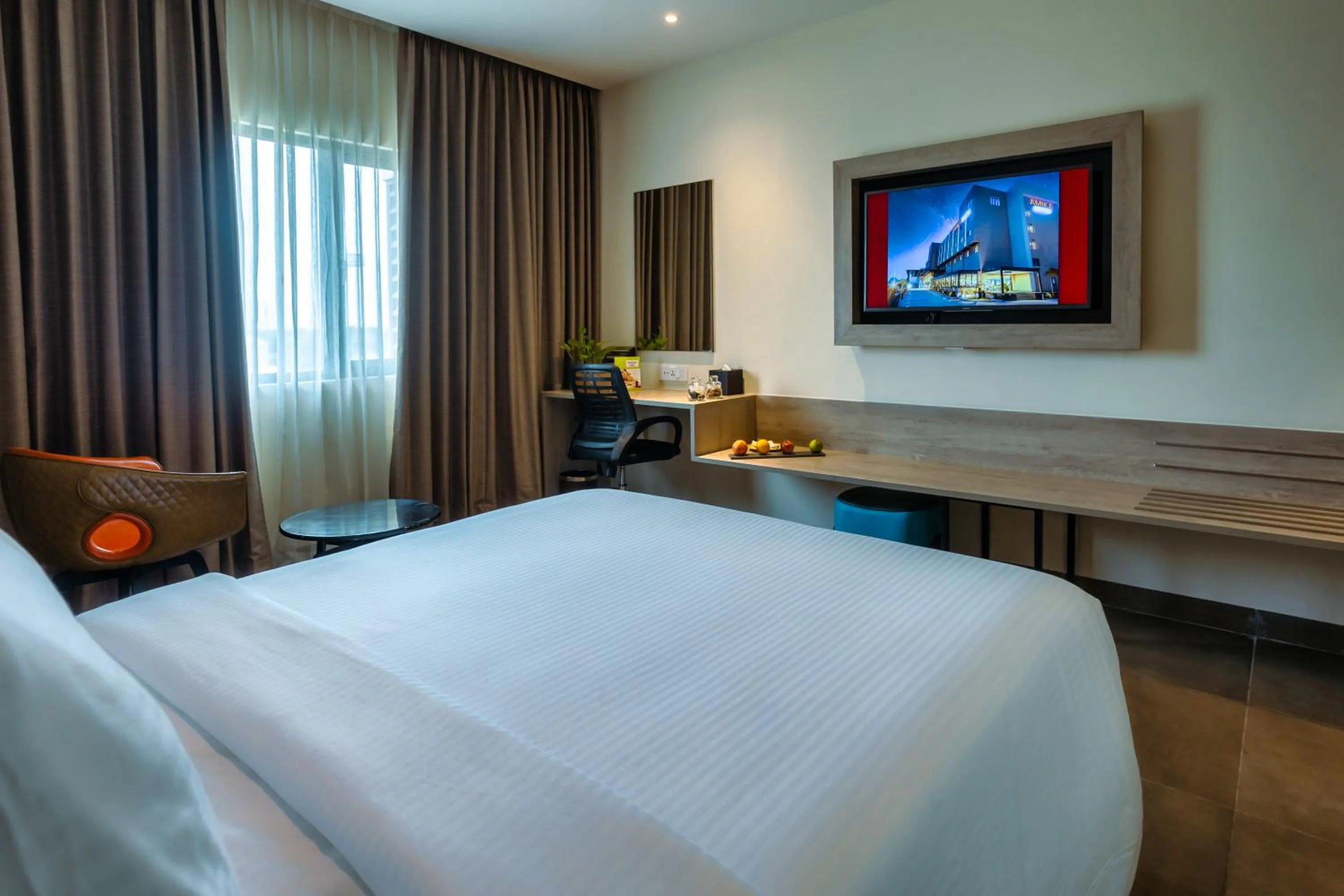 TV and multimedia, Bed in Amika Hotel,Madurai - Near Airport
