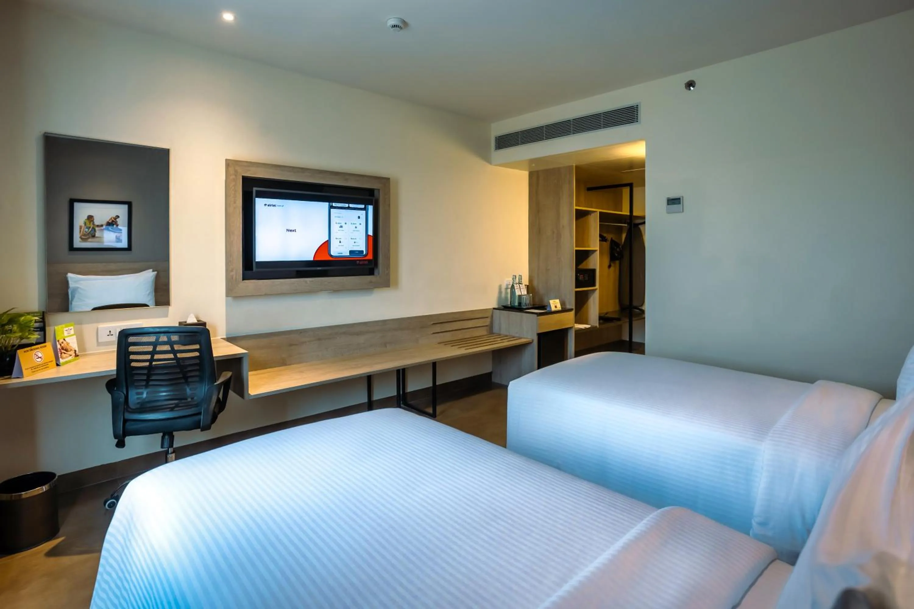 Photo of the whole room, Bed in Amika Hotel,Madurai - Near Airport