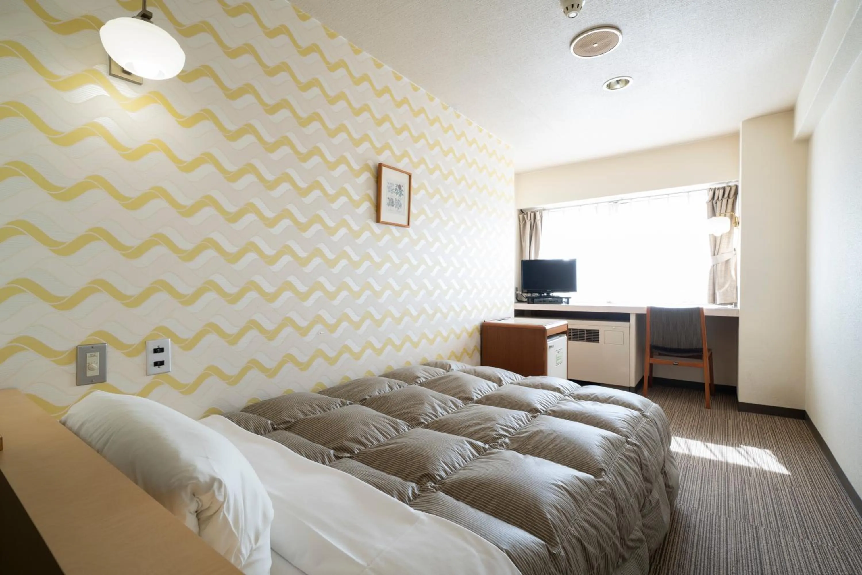 Photo of the whole room, Bed in Hotel Econo Higashi Kanazawa