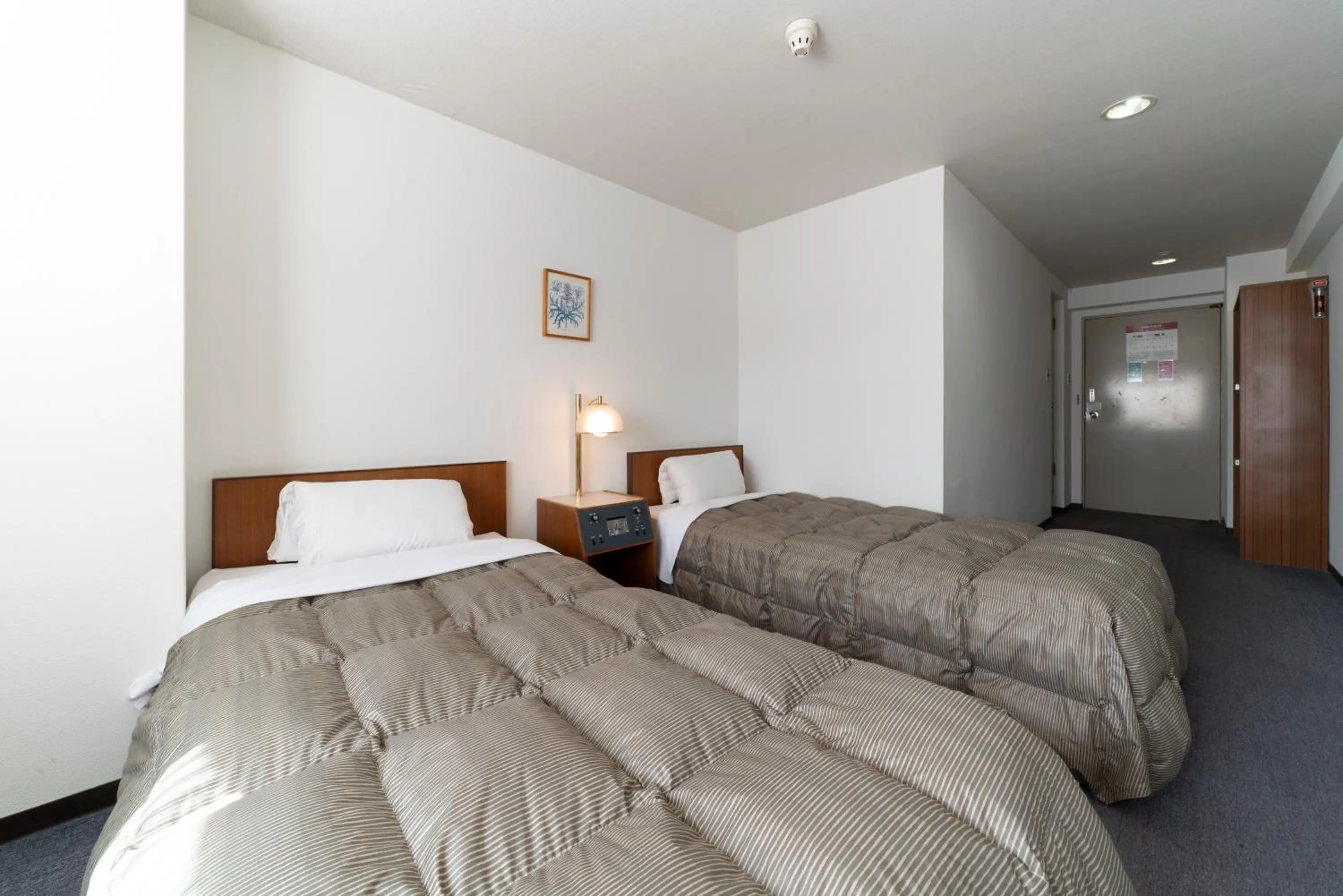 Photo of the whole room, Bed in Hotel Econo Higashi Kanazawa