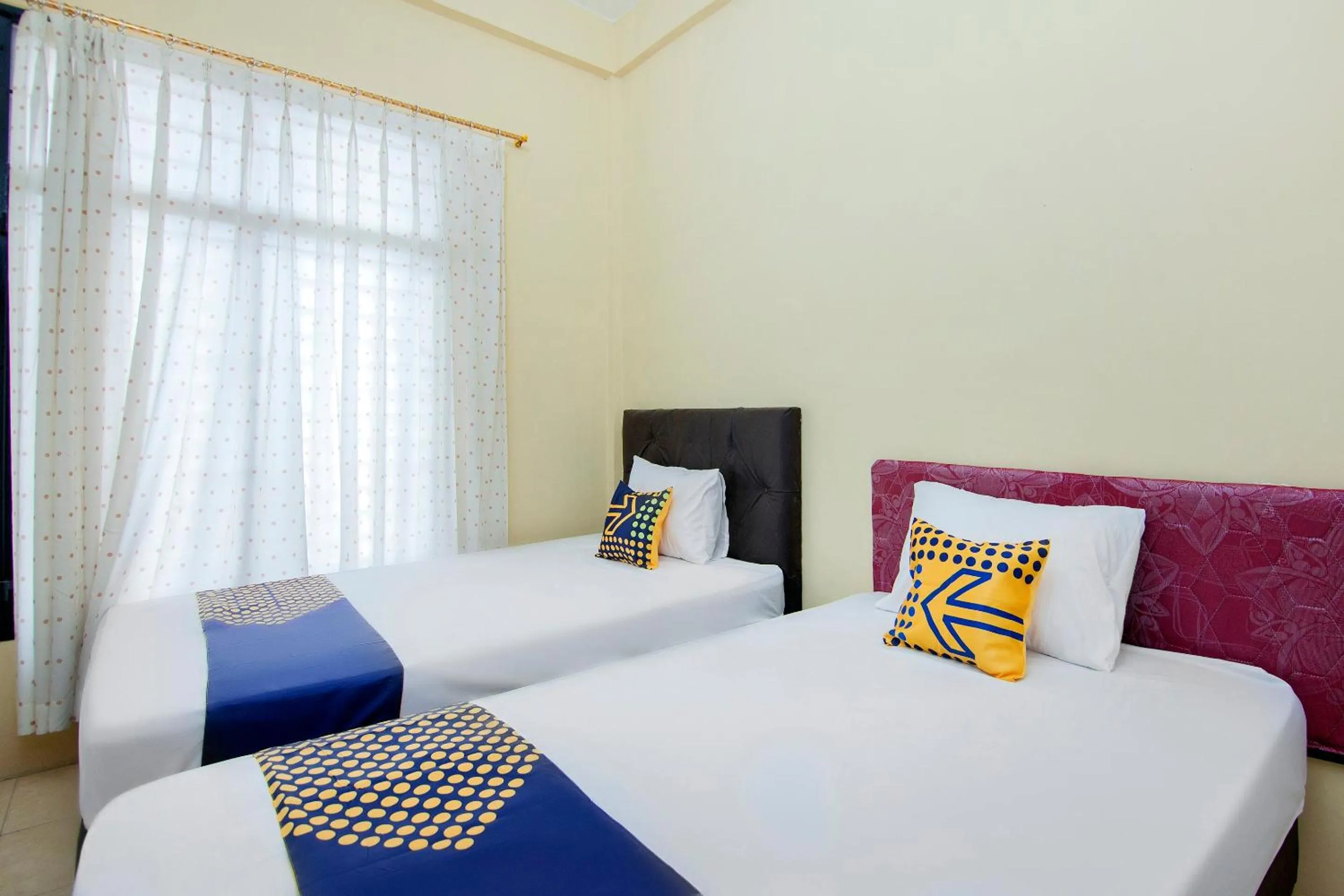 Bedroom, Bed in SPOT ON 2076 Hotel Stadion