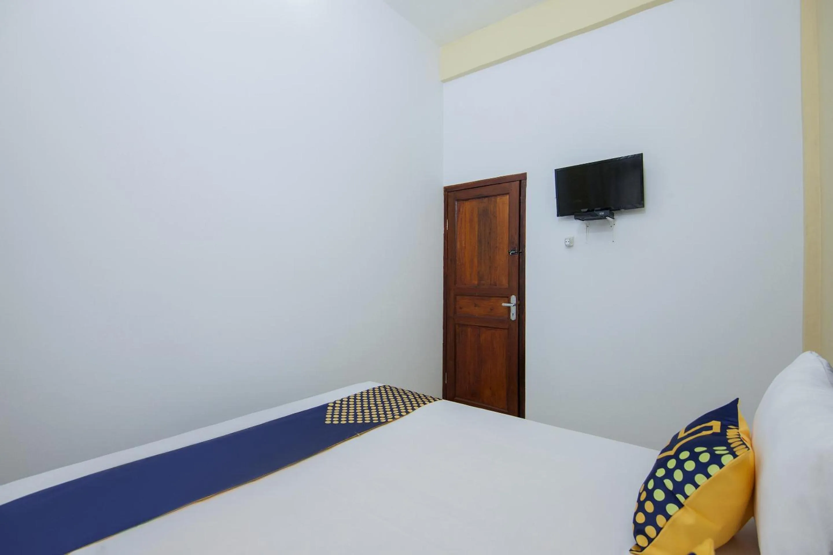 Bedroom, Bed in SPOT ON 2076 Hotel Stadion