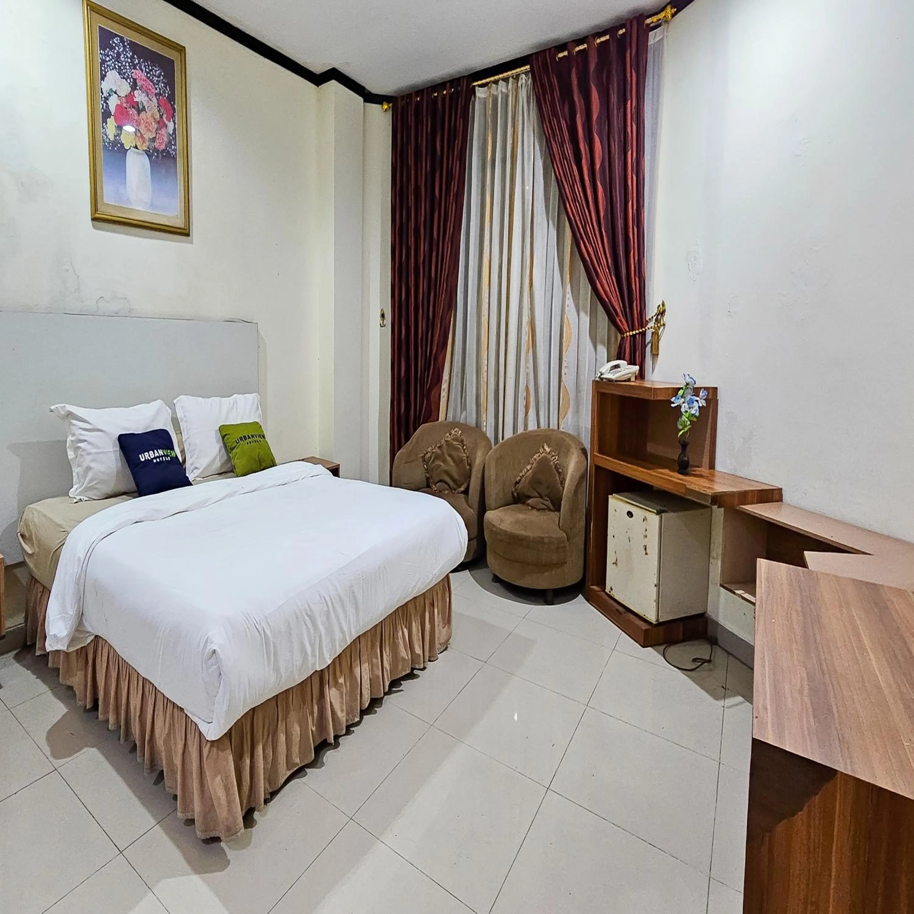 Bedroom, Bed in Urbanview Hotel Kharisma Banjarmasin