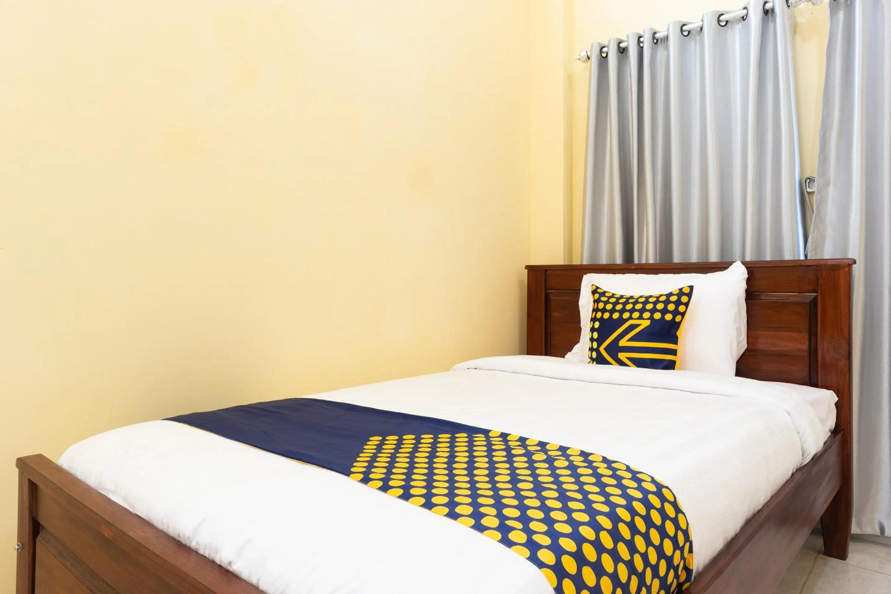 Bedroom in SPOT ON 2063 Bethania Residence