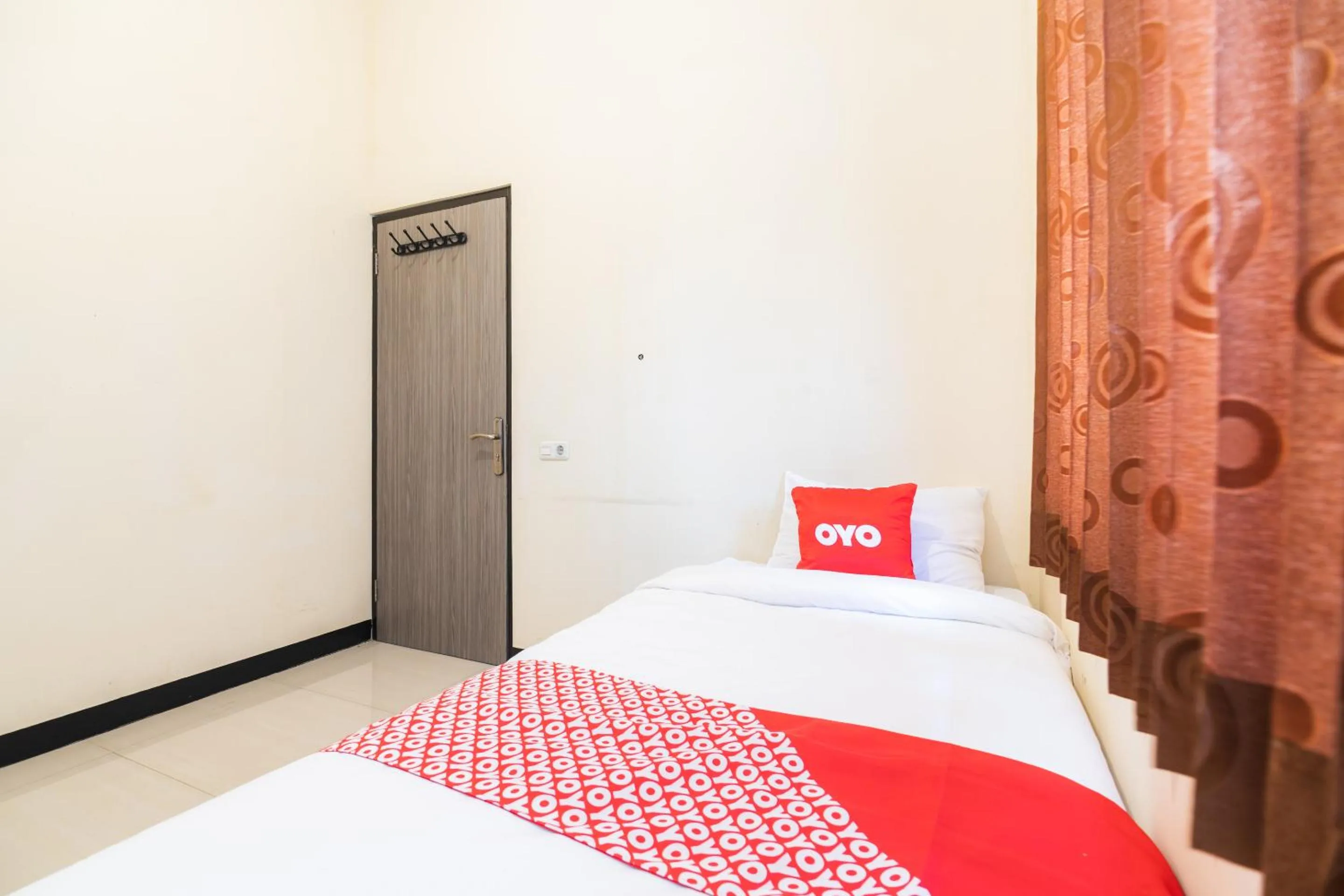 Bedroom in OYO 1956 Kana Family Residence