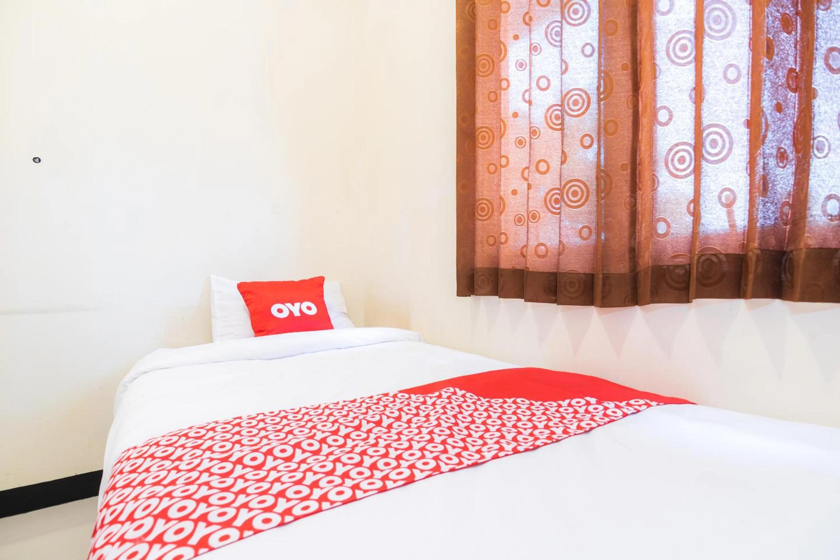 Bedroom in OYO 1956 Kana Family Residence