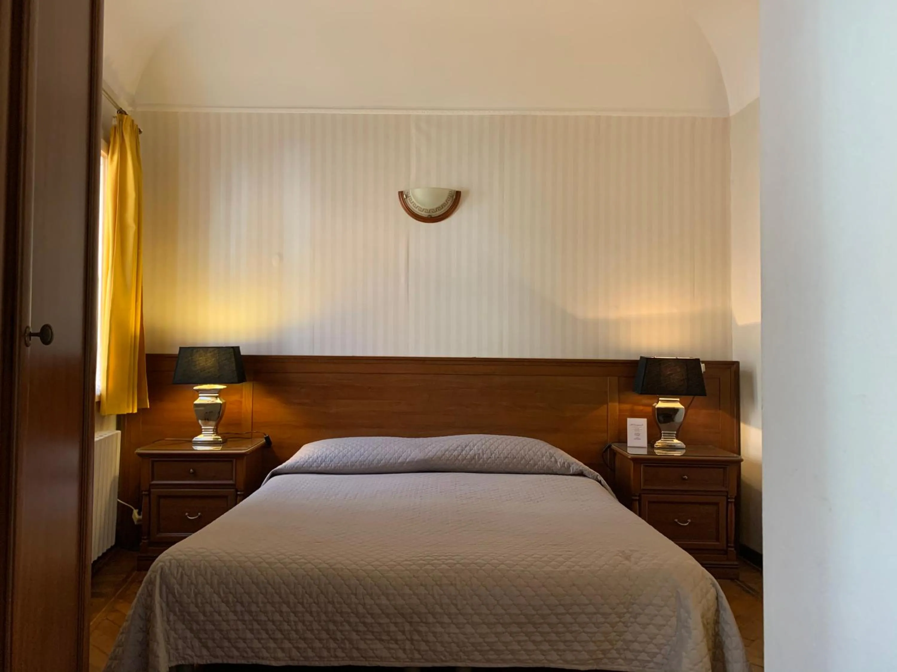 Bedroom in AL CAMPANIEL BED AND BREAKFAST