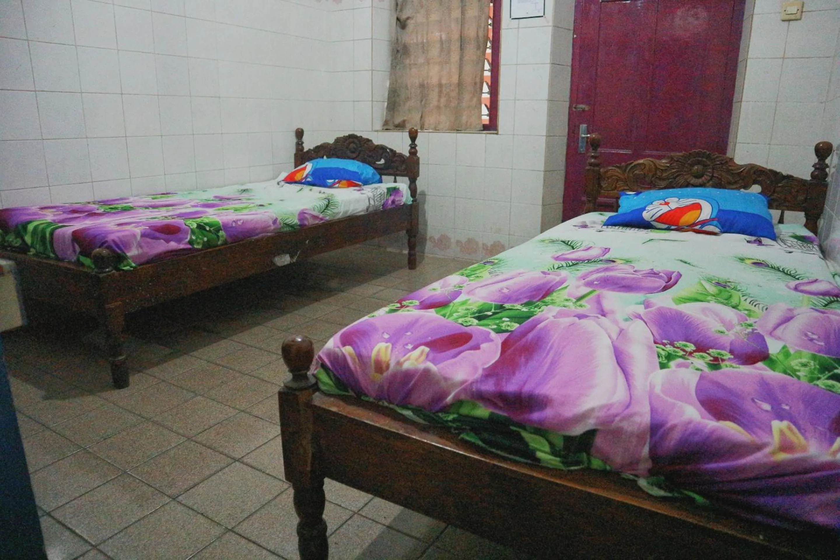 Bedroom, Bed in OYO Life 1972 Aman Family Inn Syariah