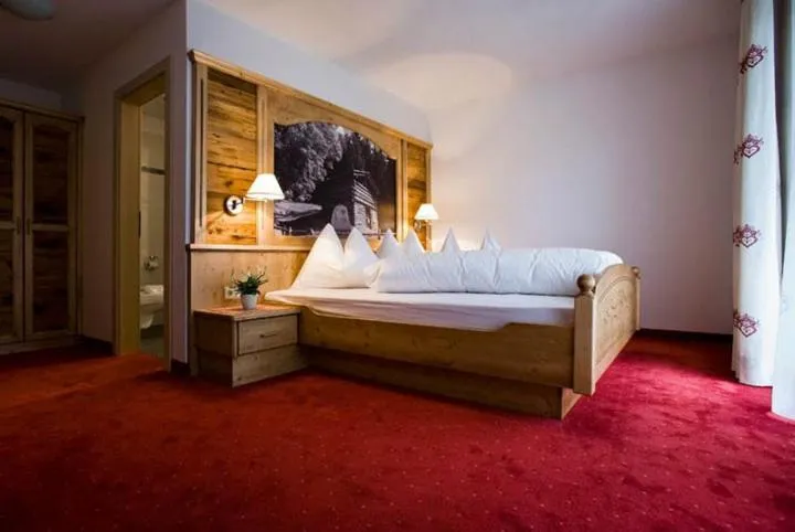 Bedroom, Bed in Hotel Pfandleralm
