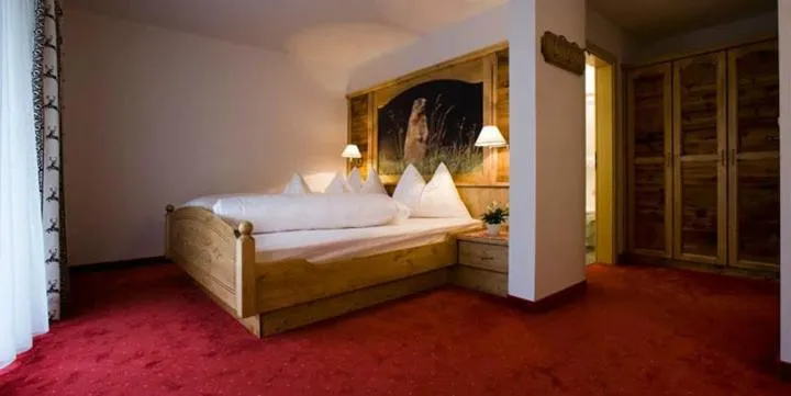 Bedroom, Bed in Hotel Pfandleralm