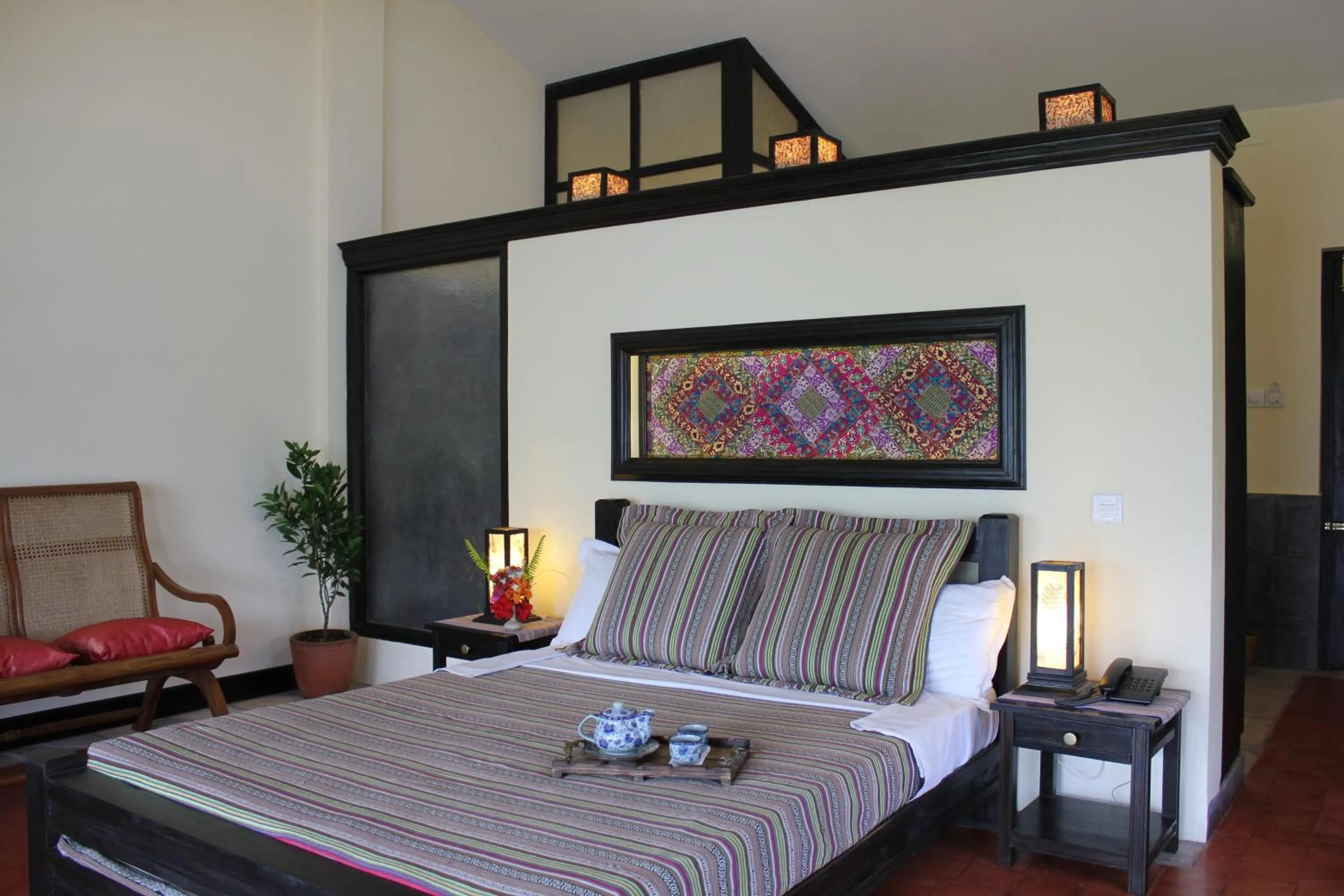 Bed in The Begnas Lake Resort & Villas