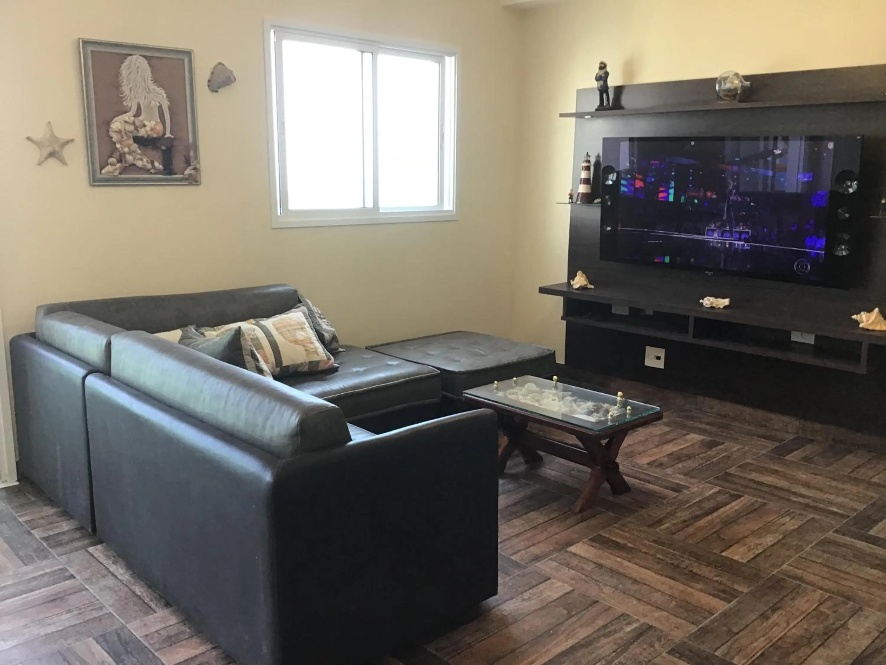 Communal lounge/ TV room in Duplex charmoso