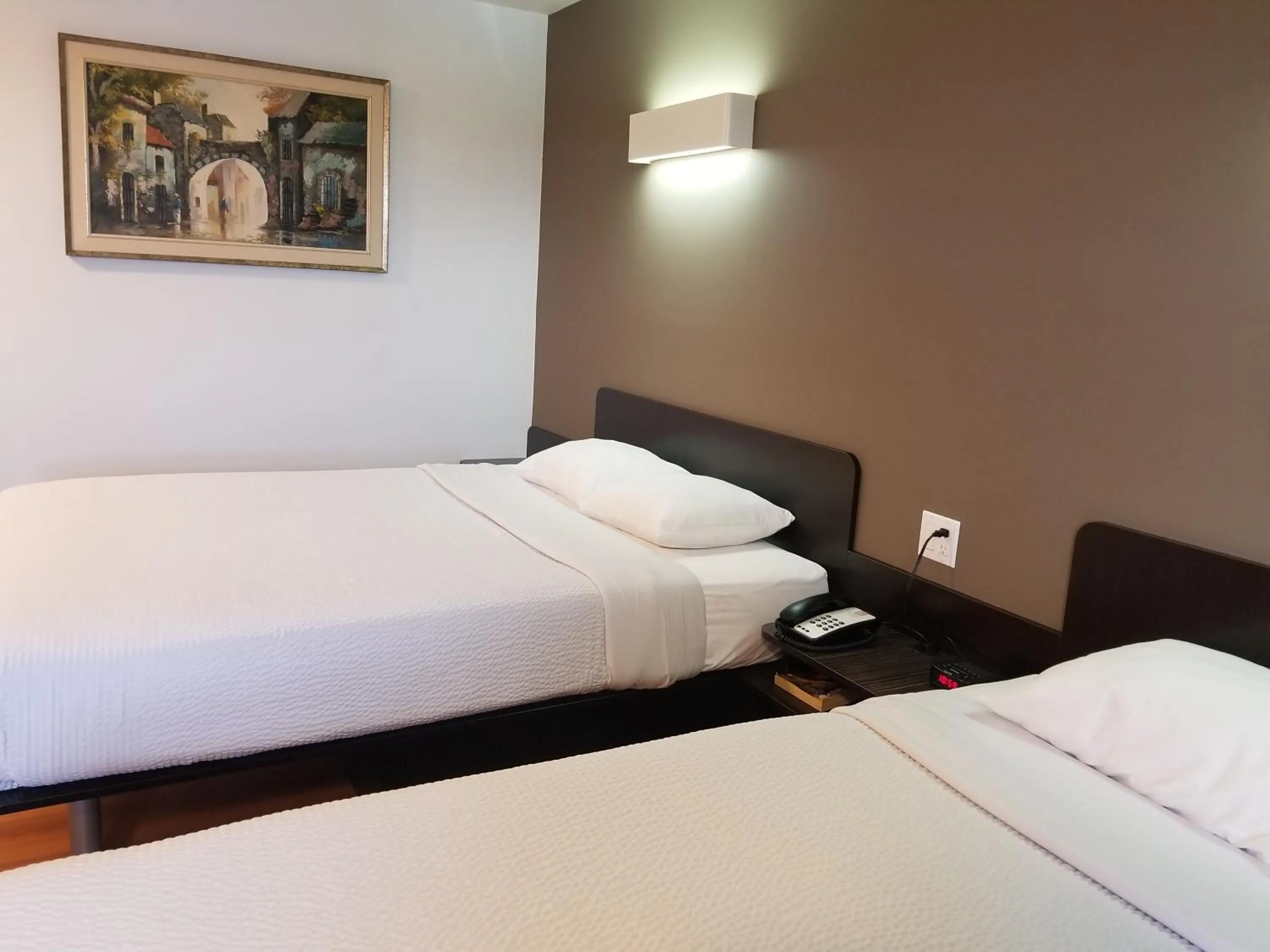 Bed in Joys Inn Innisfail, AB