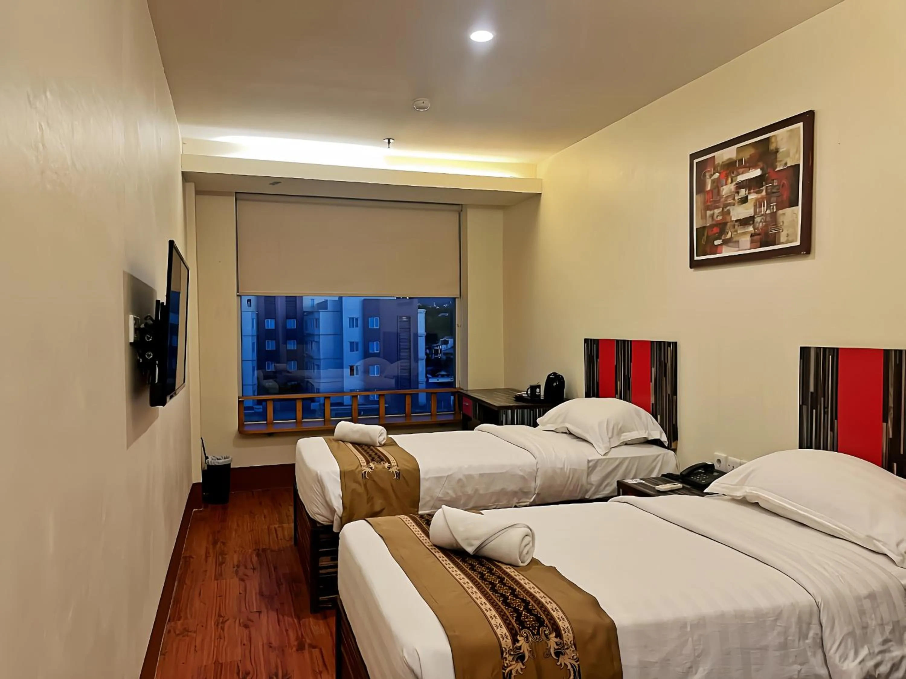 Bed in Lion Hotel & Plaza Manado