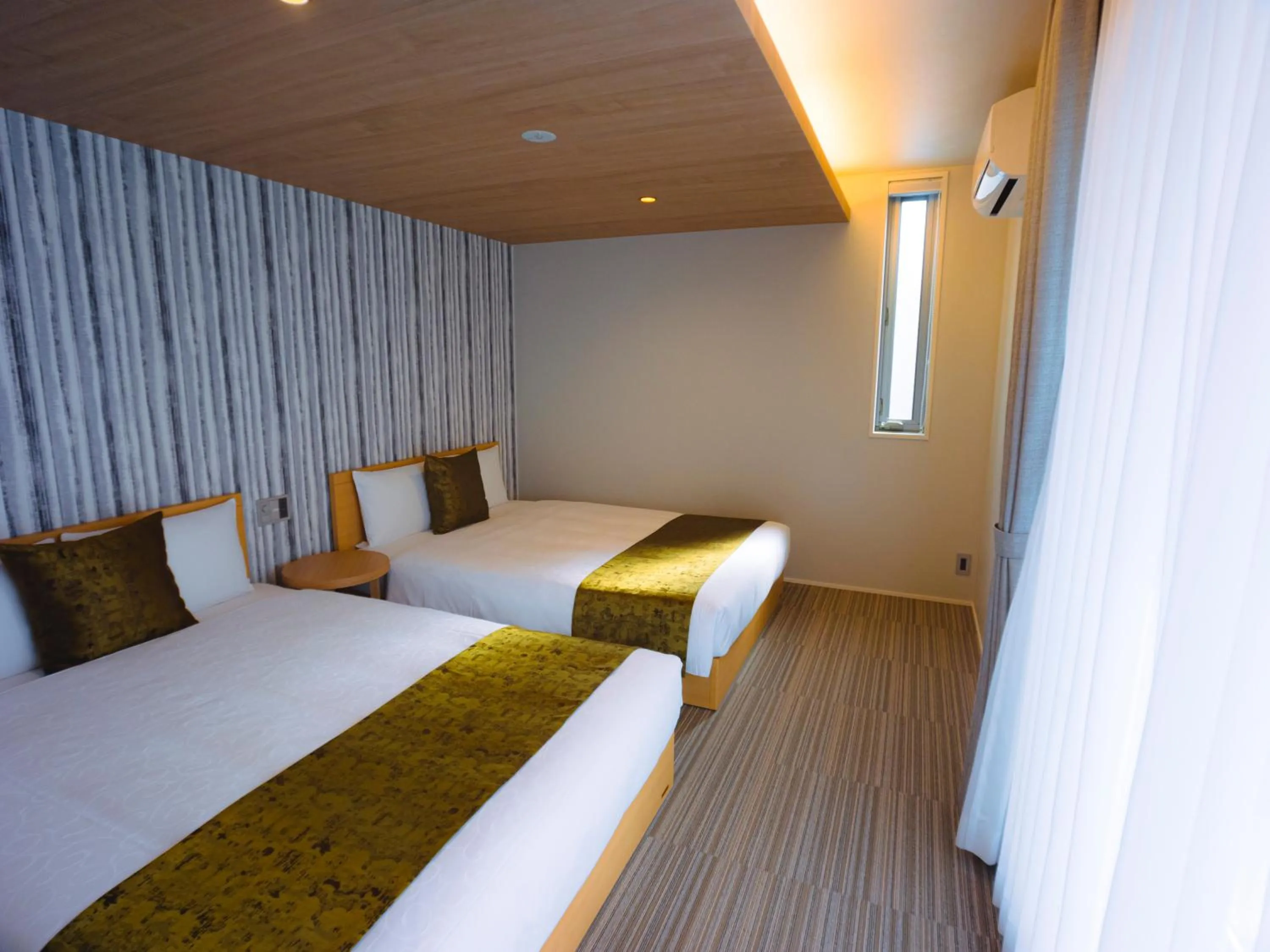 Bedroom, Bed in GRAND BASE Hakata Sumiyoshi