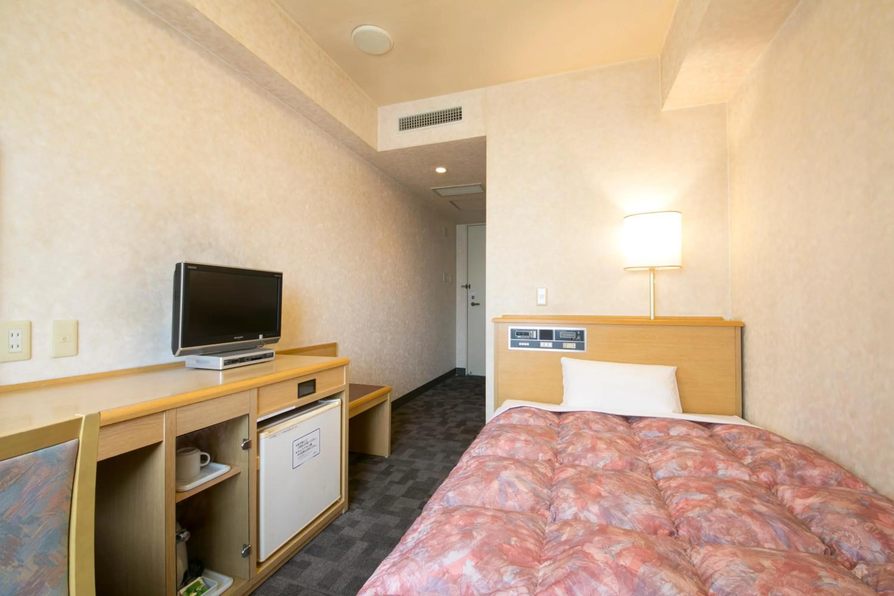 Photo of the whole room, Bed in Kuwana Green Hotel