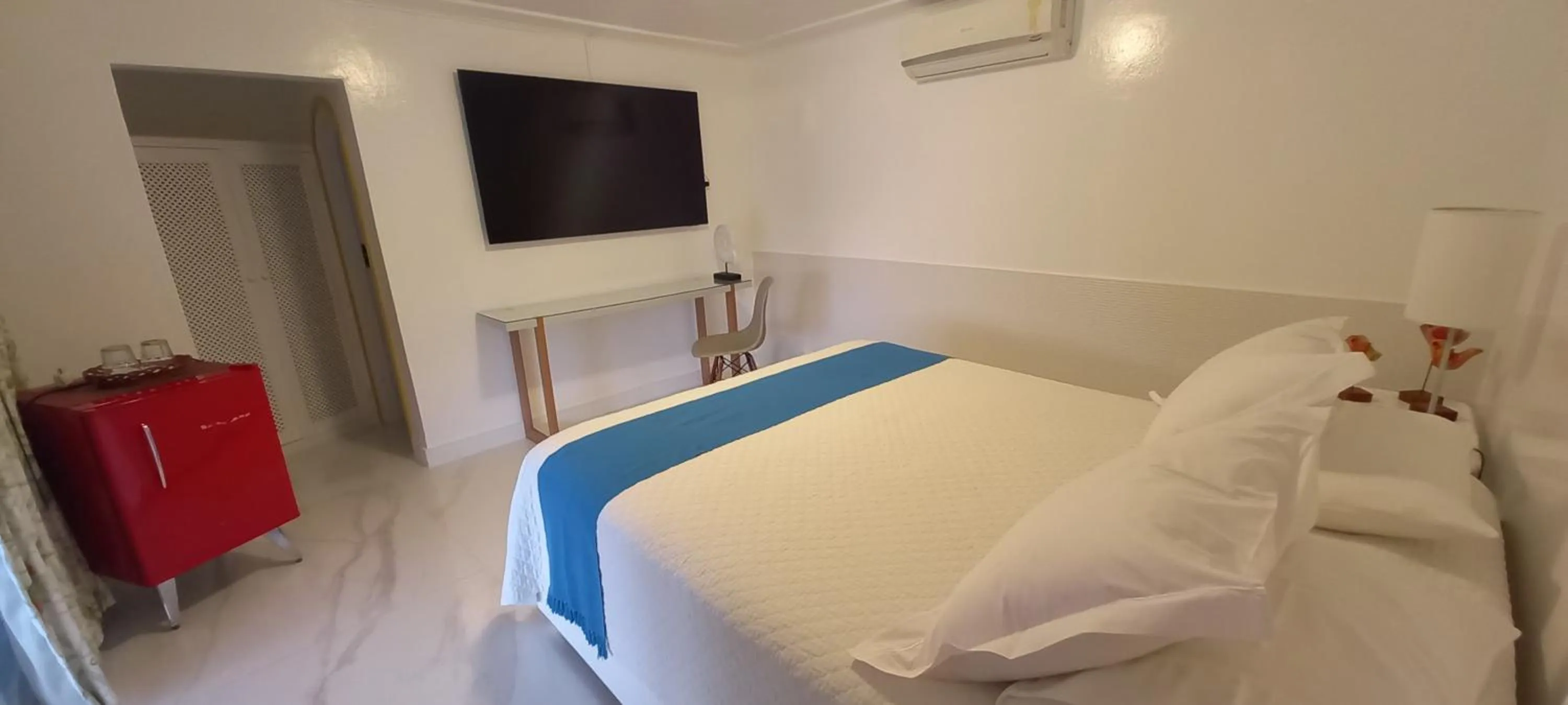 Bed in Pousada Mestre Augusto