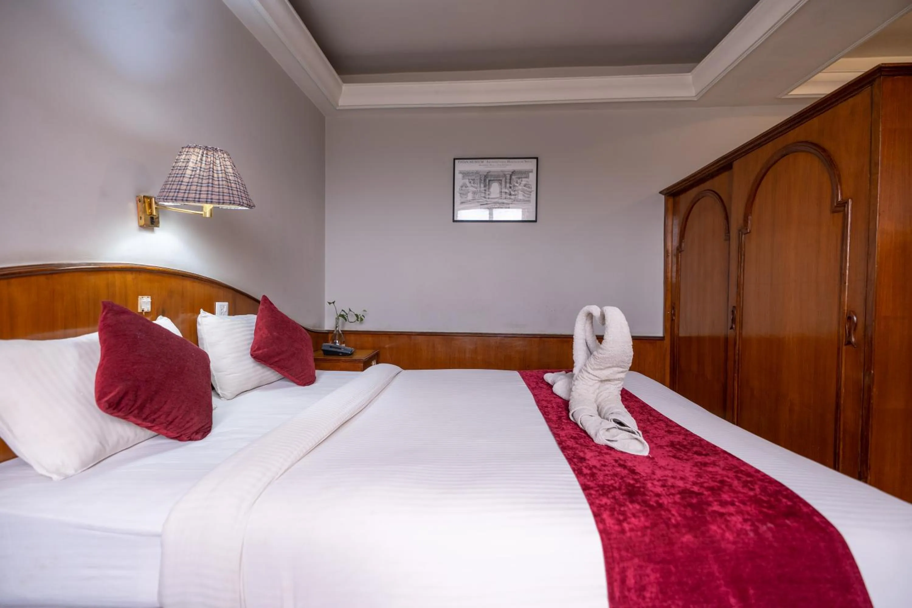 Bed in Mystic Homes Hotel