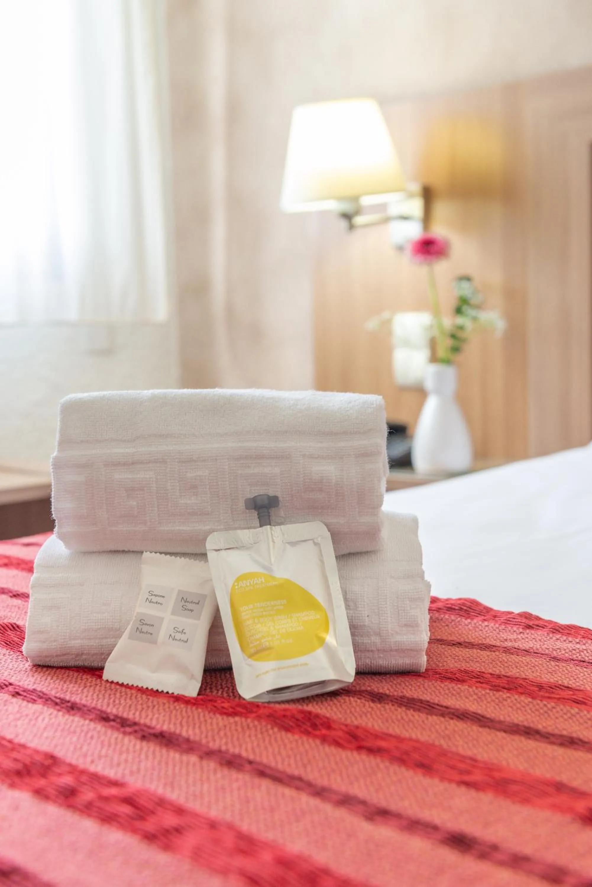 towels, Bed in Brit Hotel Confort Castres