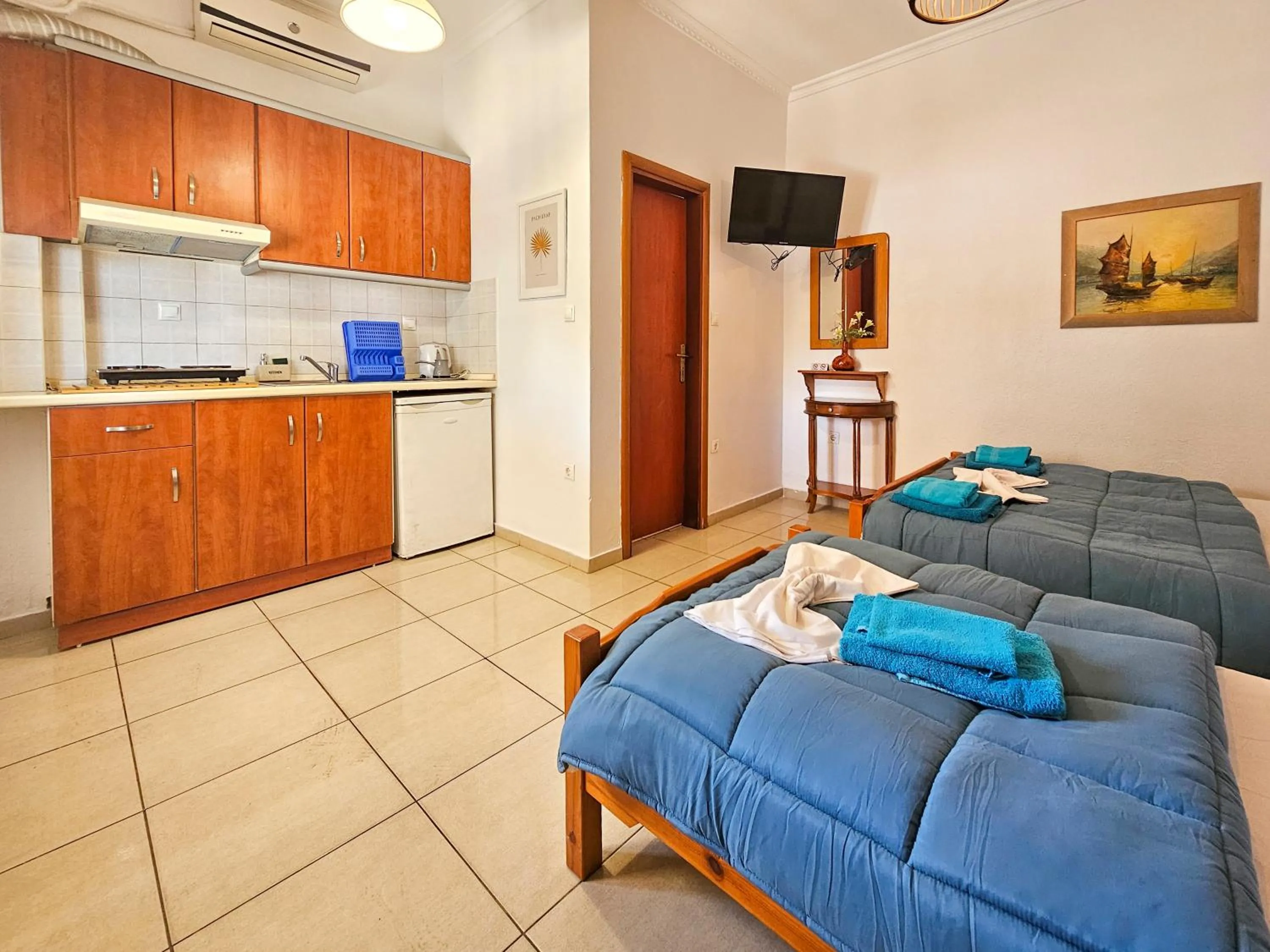 Bed in Hotel Exarhos