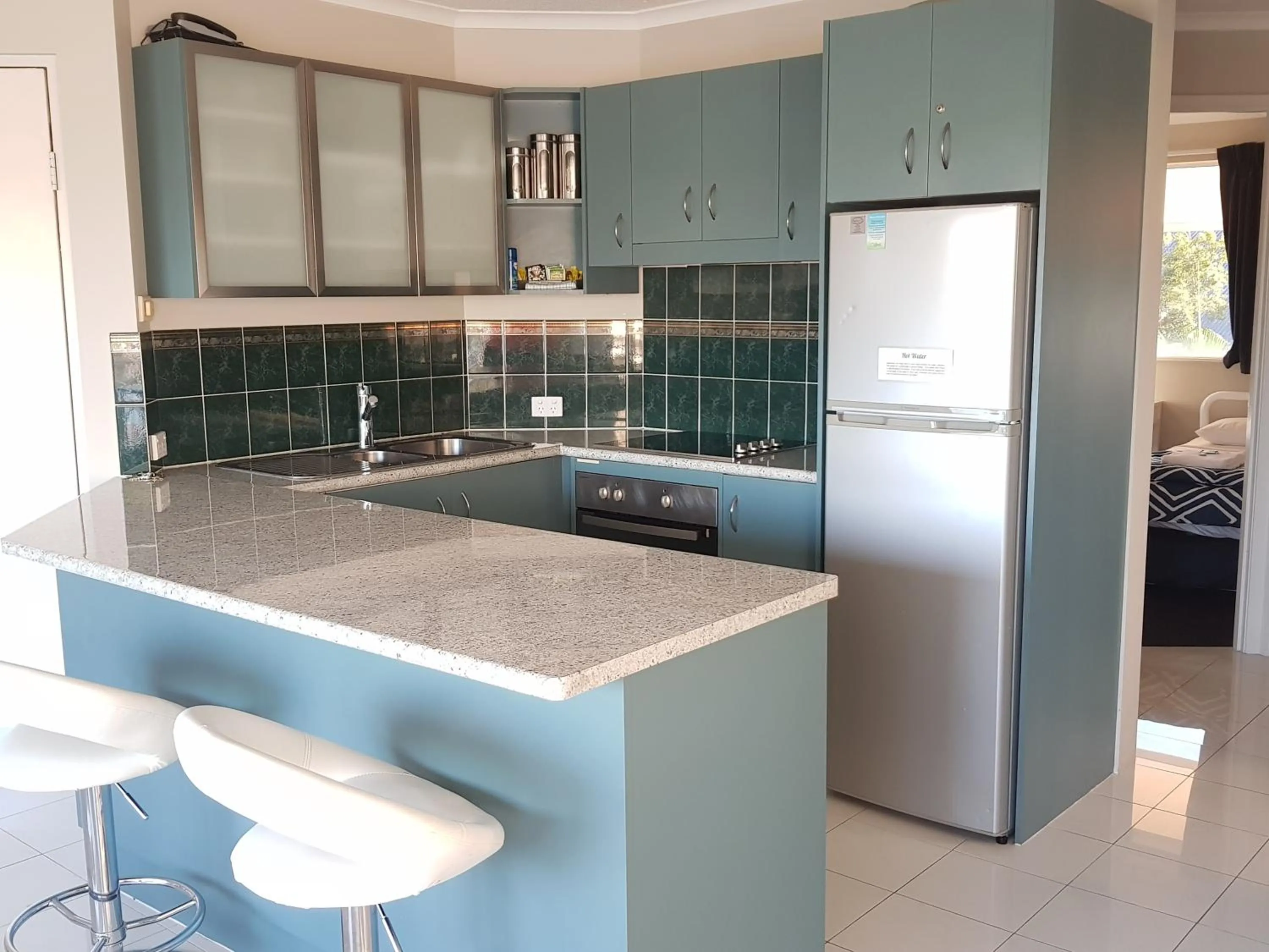 Kitchen or kitchenette in Excellsior Apartments