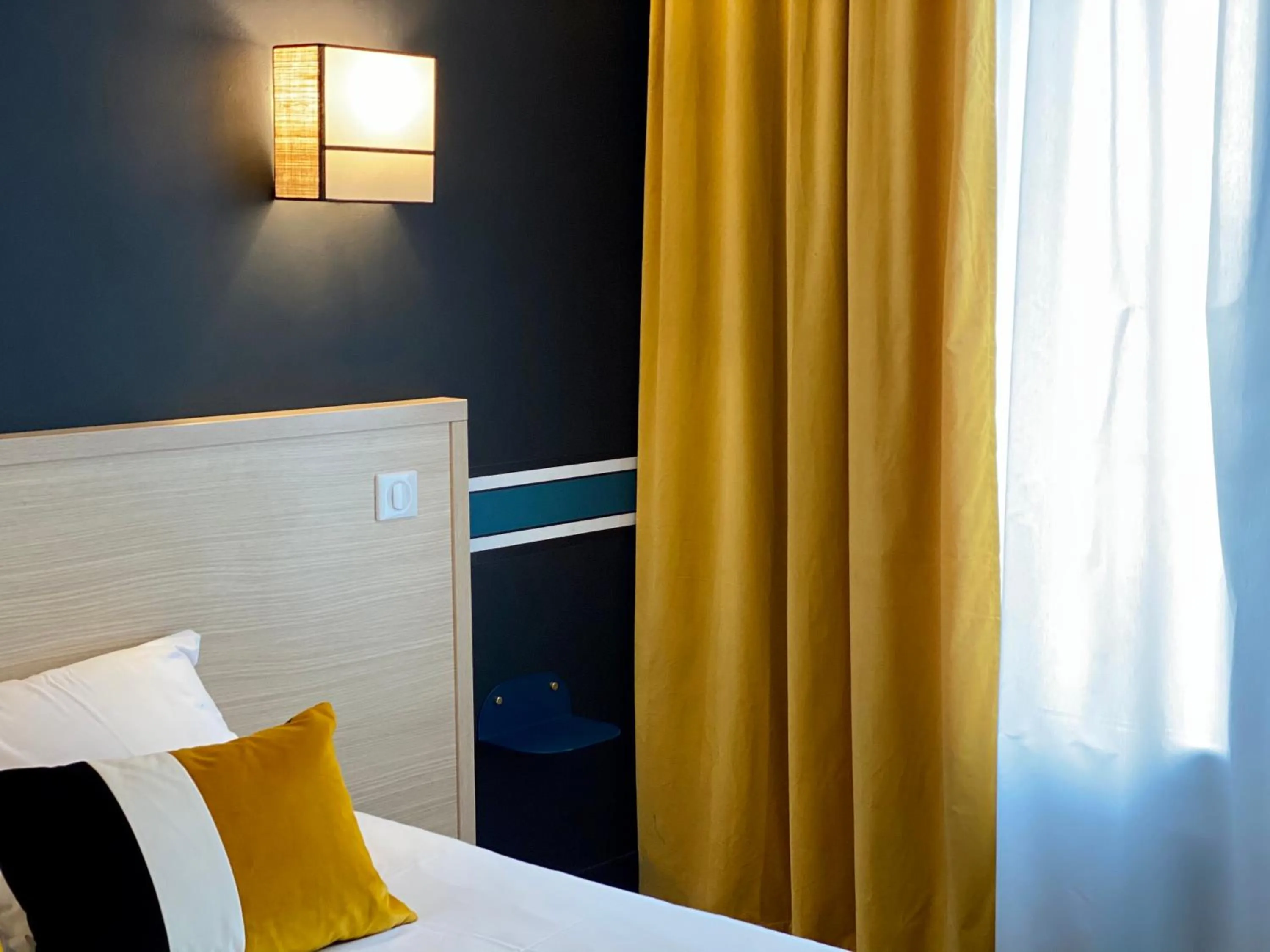 Bed in Hotel Saint Louis