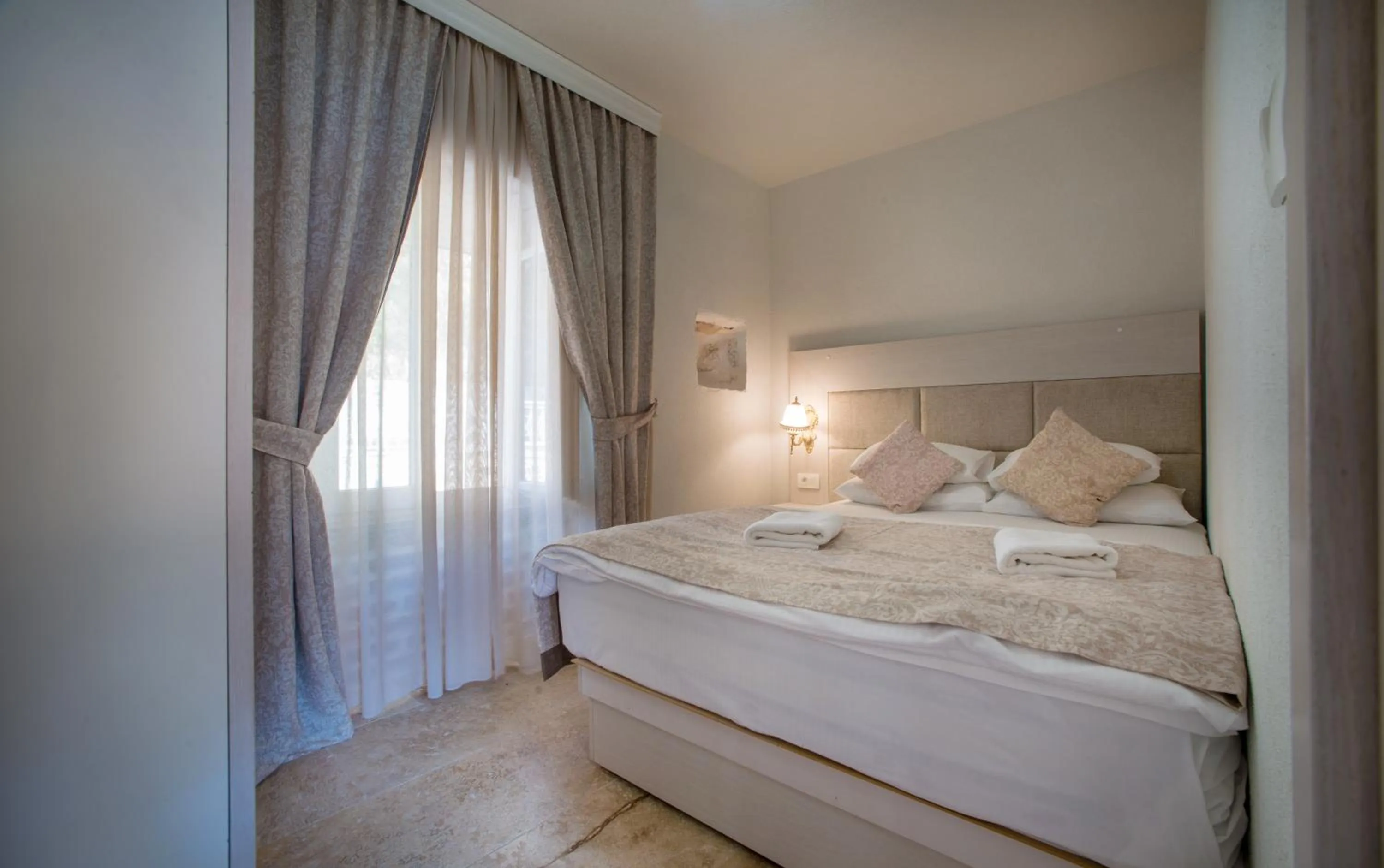 Bed in Conte Hotel & Restaurant