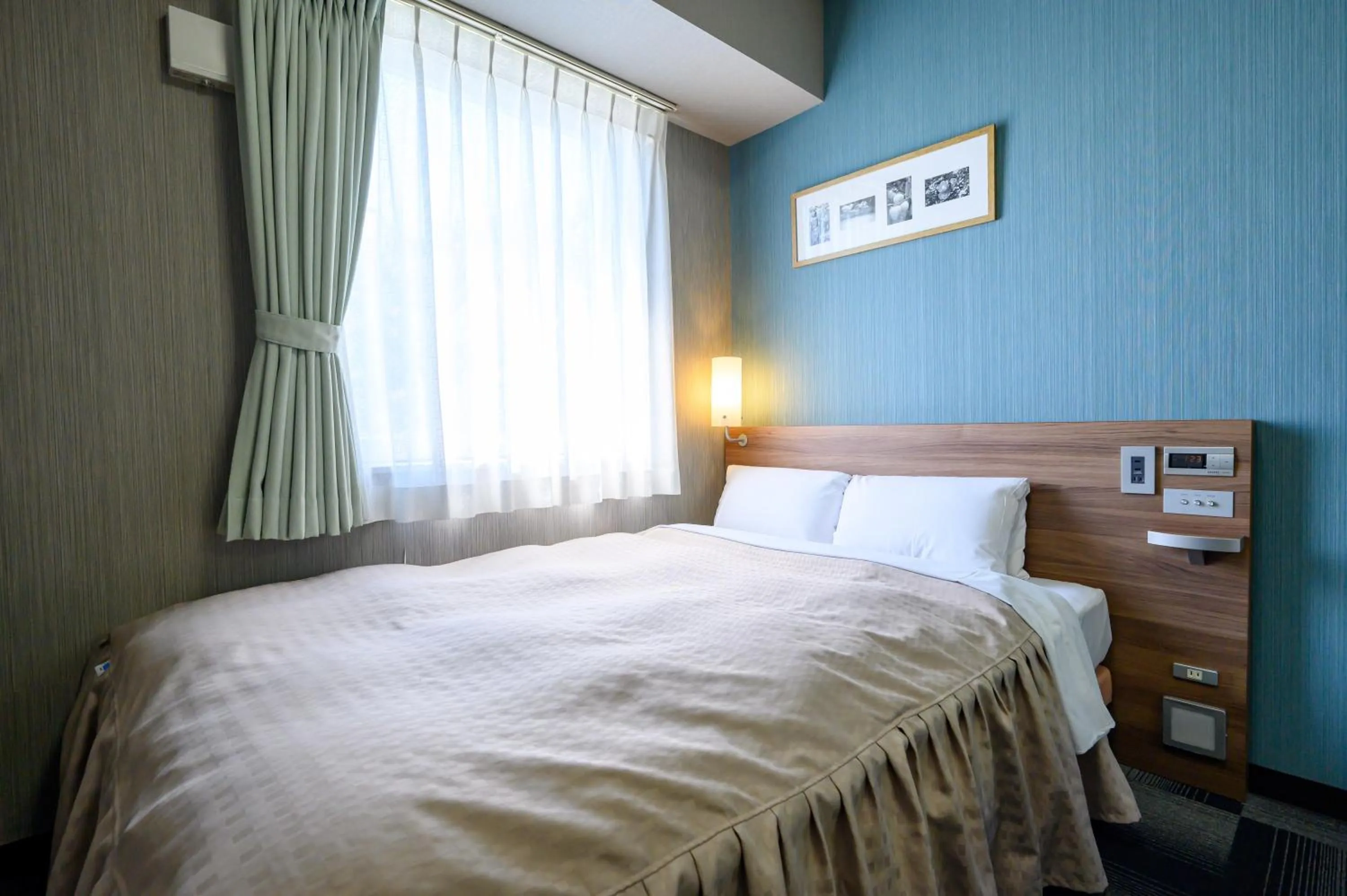 Photo of the whole room, Bed in Hotel Econo Kameyama