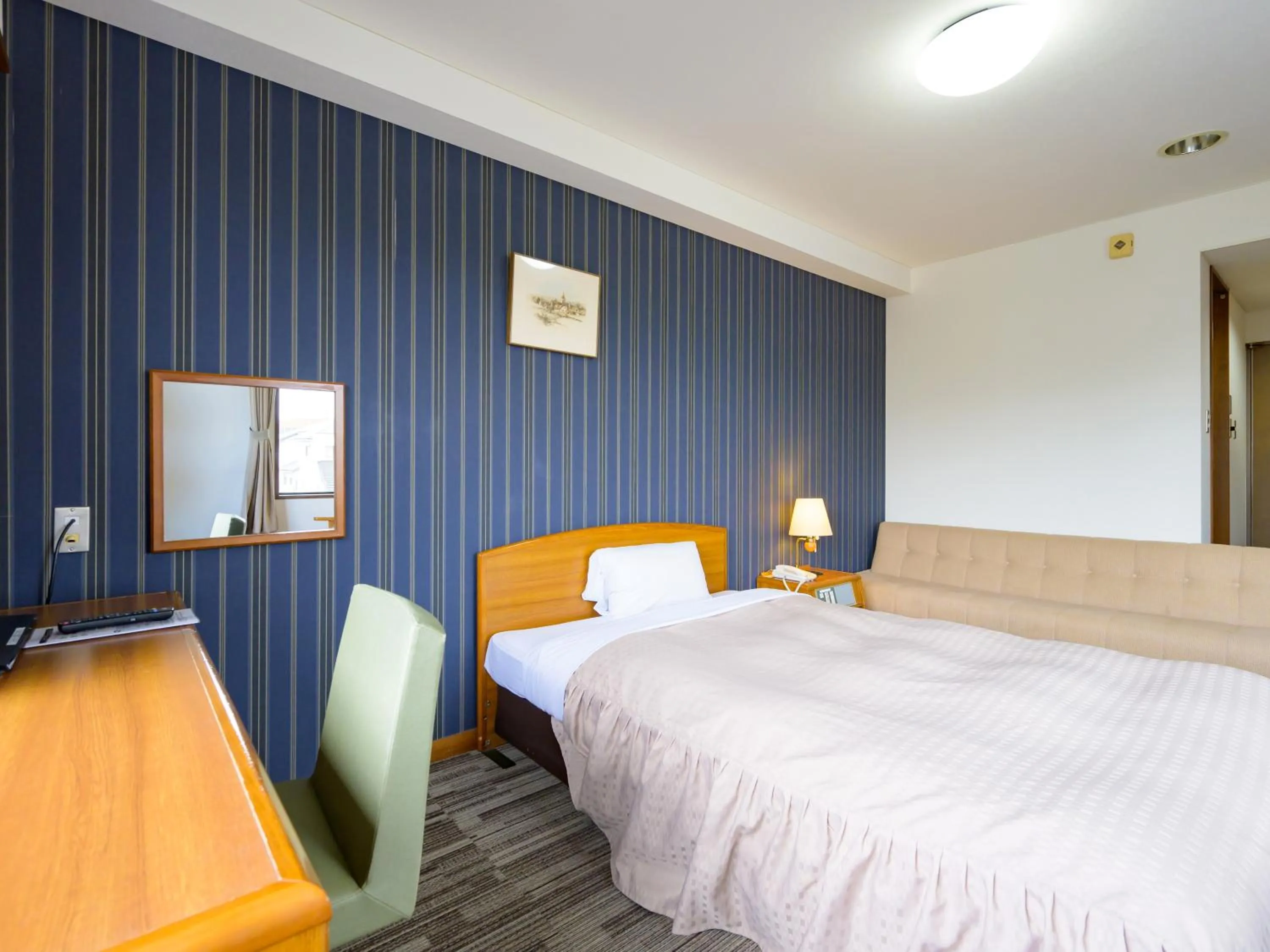 Photo of the whole room, Bed in Hisai Green Hotel