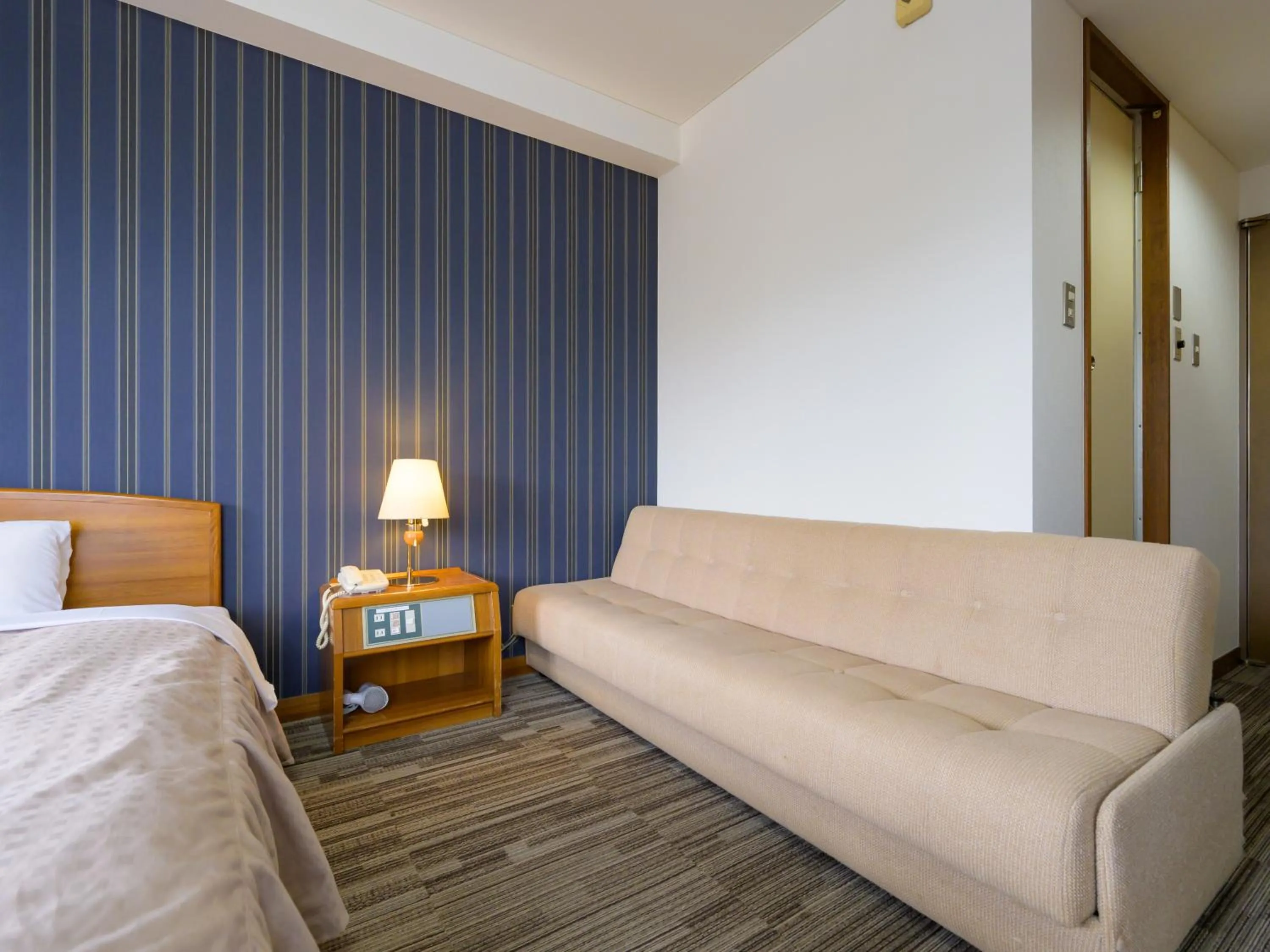 Photo of the whole room, Bed in Hisai Green Hotel